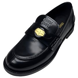 Miu Miu Mocassins Penny en cuir noir Noir