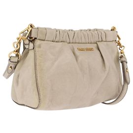 Miu Miu Bolsa de ombro em couro bege tom dourado Outro