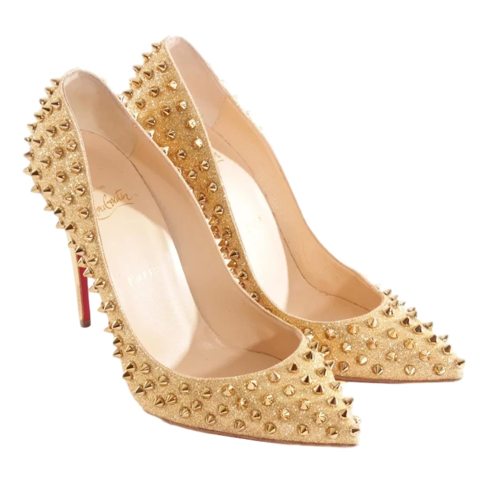 gold louboutins