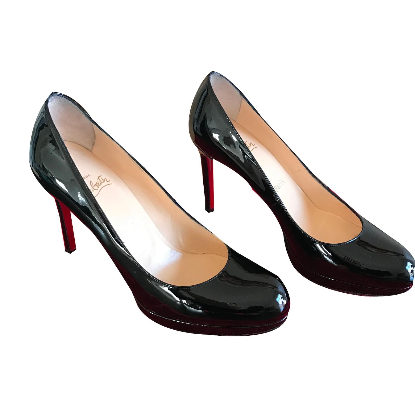 black patent louboutins