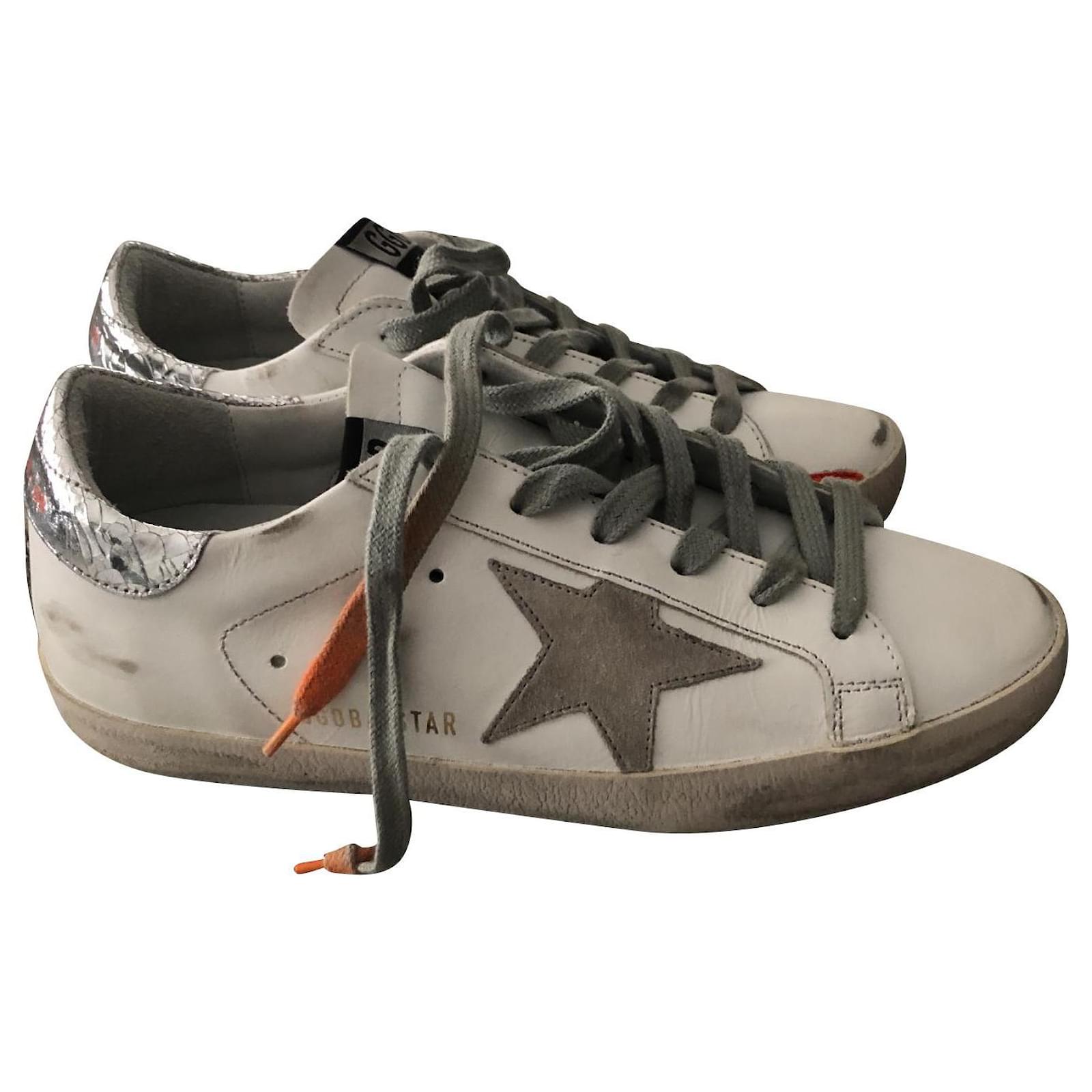 orange golden goose sneakers