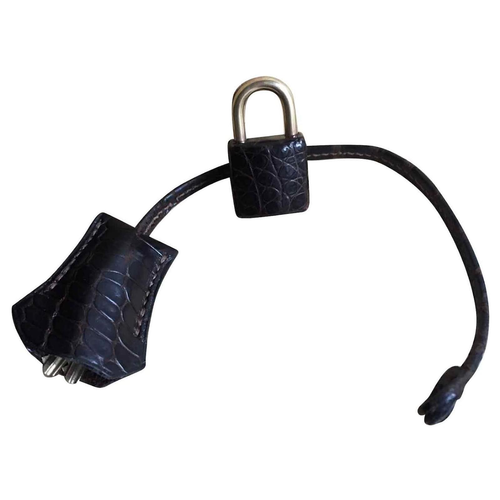 Hermès Chiusura a coccodrillo Hermos porosus e campanello per Birkin o Kelly  Marrone scuro Pelli esotiche ref.124895 - Joli Closet