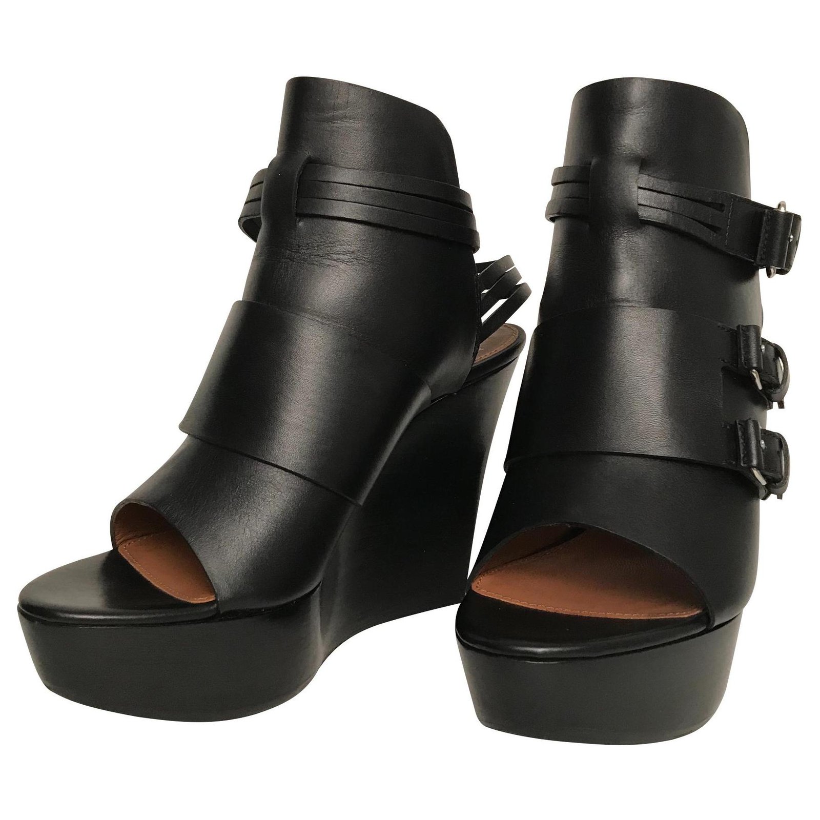 black wooden sandals