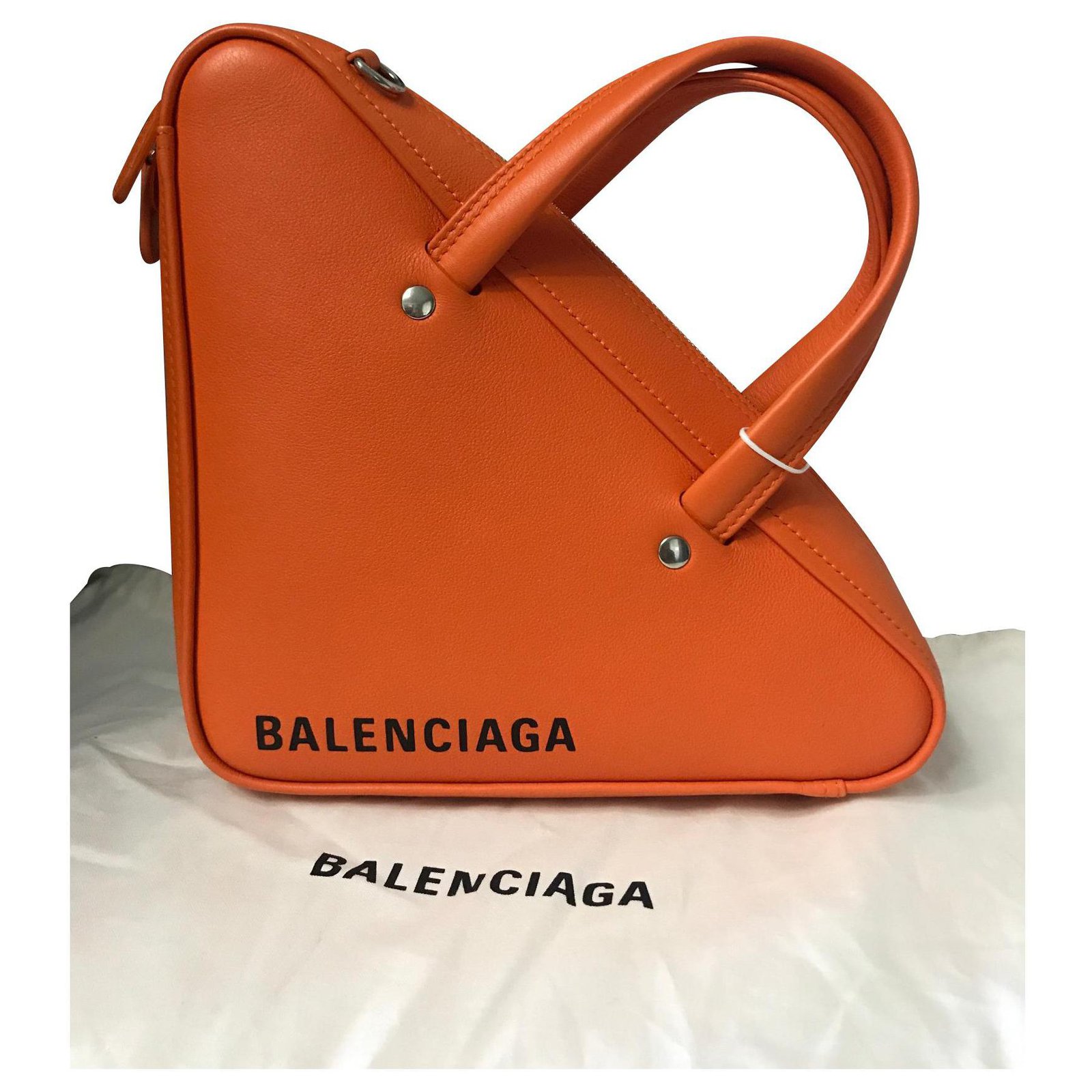 FL.ORANGE BALENCIAGA LE CAGOLE XS SHOULDER BAG (6713091VGUY) | LOZURI