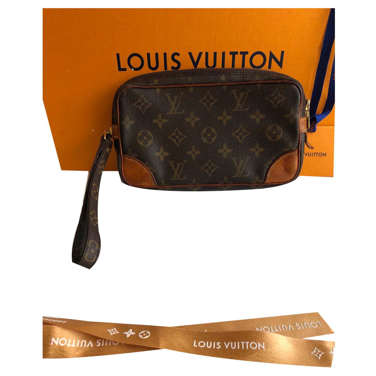 Louis Vuitton Clutch bags Brown Cloth ref.137097 - Joli Closet