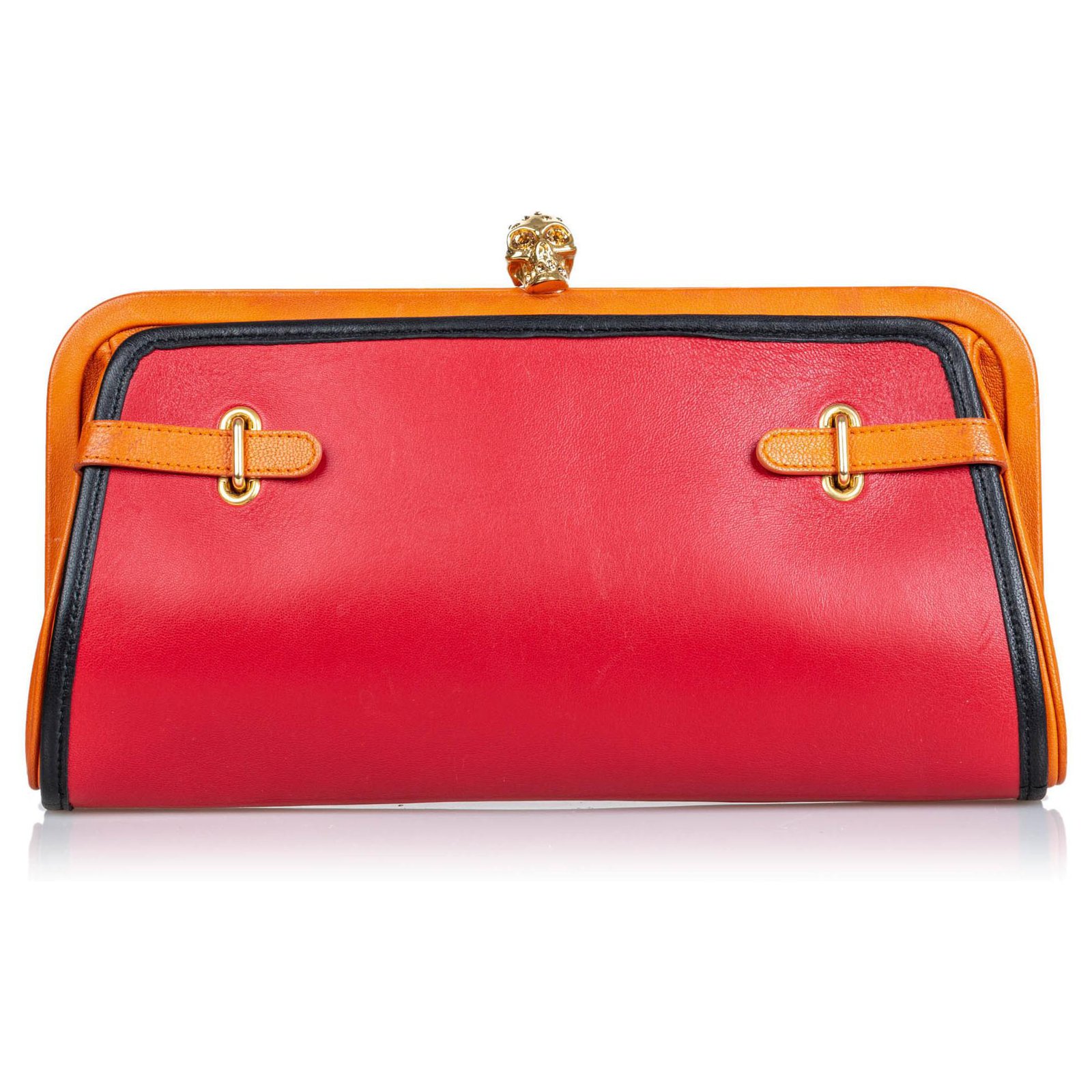pink and orange clutch bag