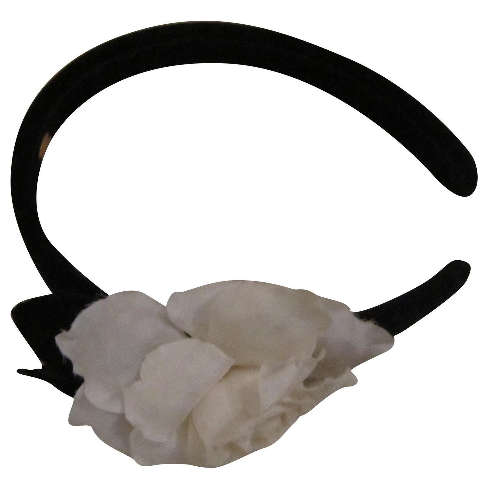 Black velvet headband with bow and Chanel white camellia.