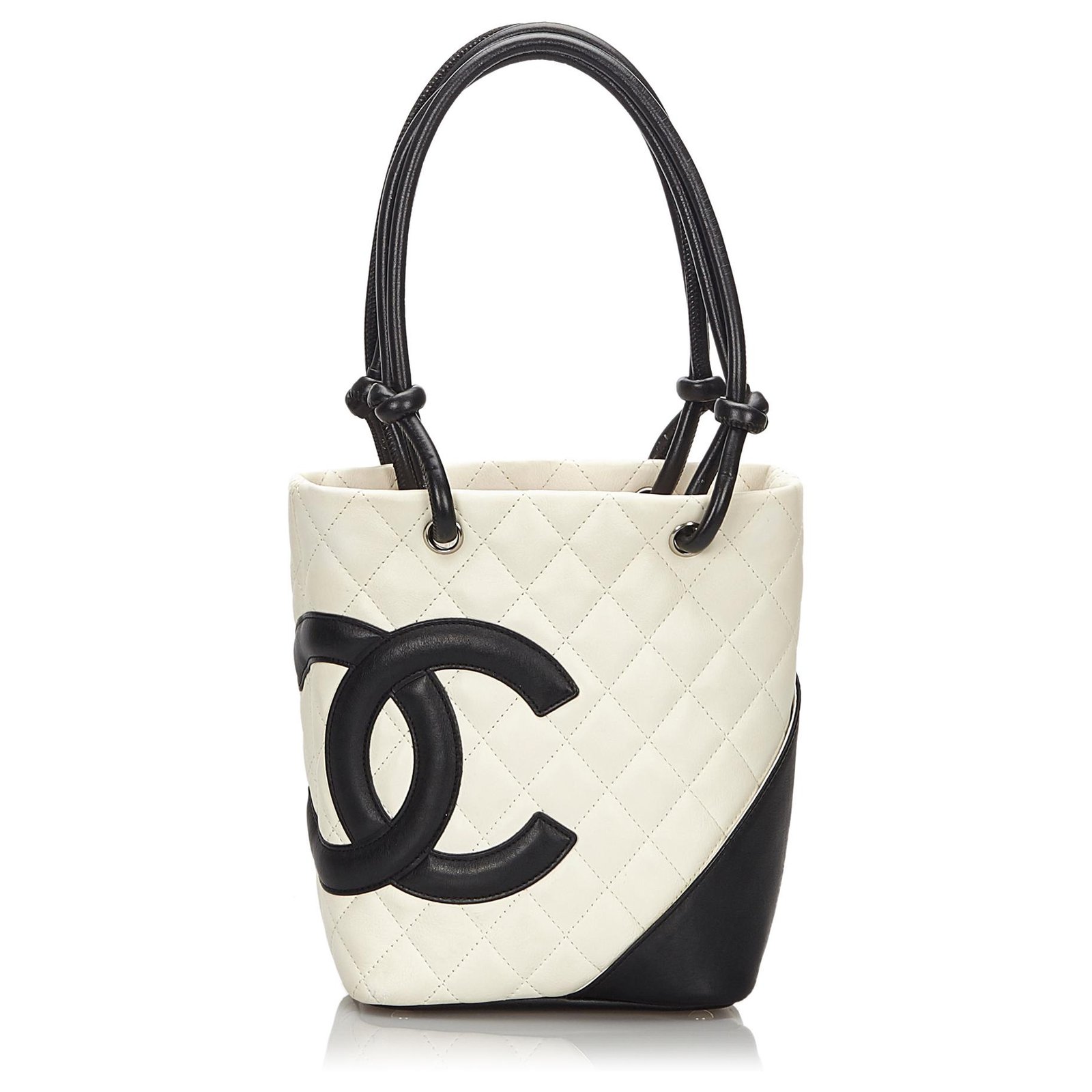 white chanel purse with black c