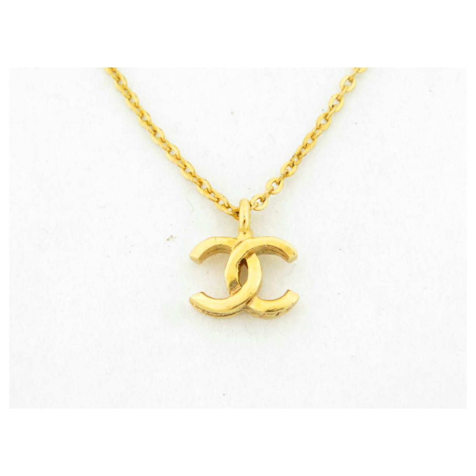 Chanel Vintage Gold Quilted CC Logo Pendant Necklace  Gold chanel Vintage  chanel Chanel pendant