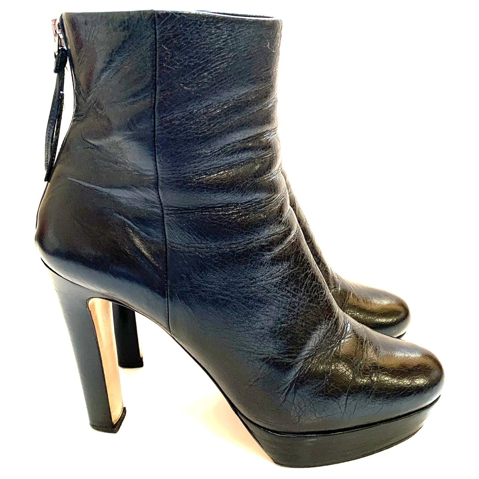 Miu Miu platform high heeled leather ankle boots. size 38,5 Black ref.208755 Joli Closet