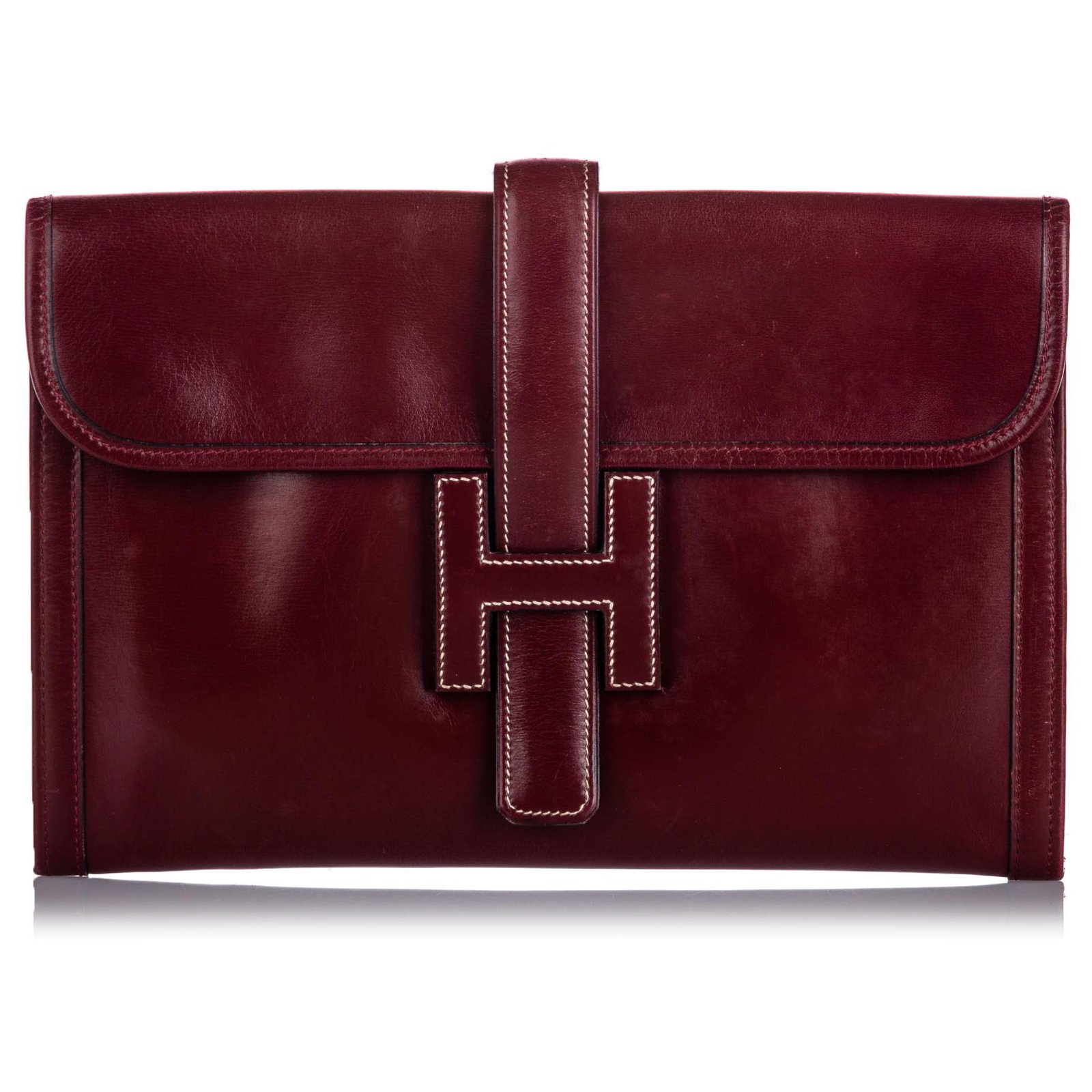 red leather clutch bag