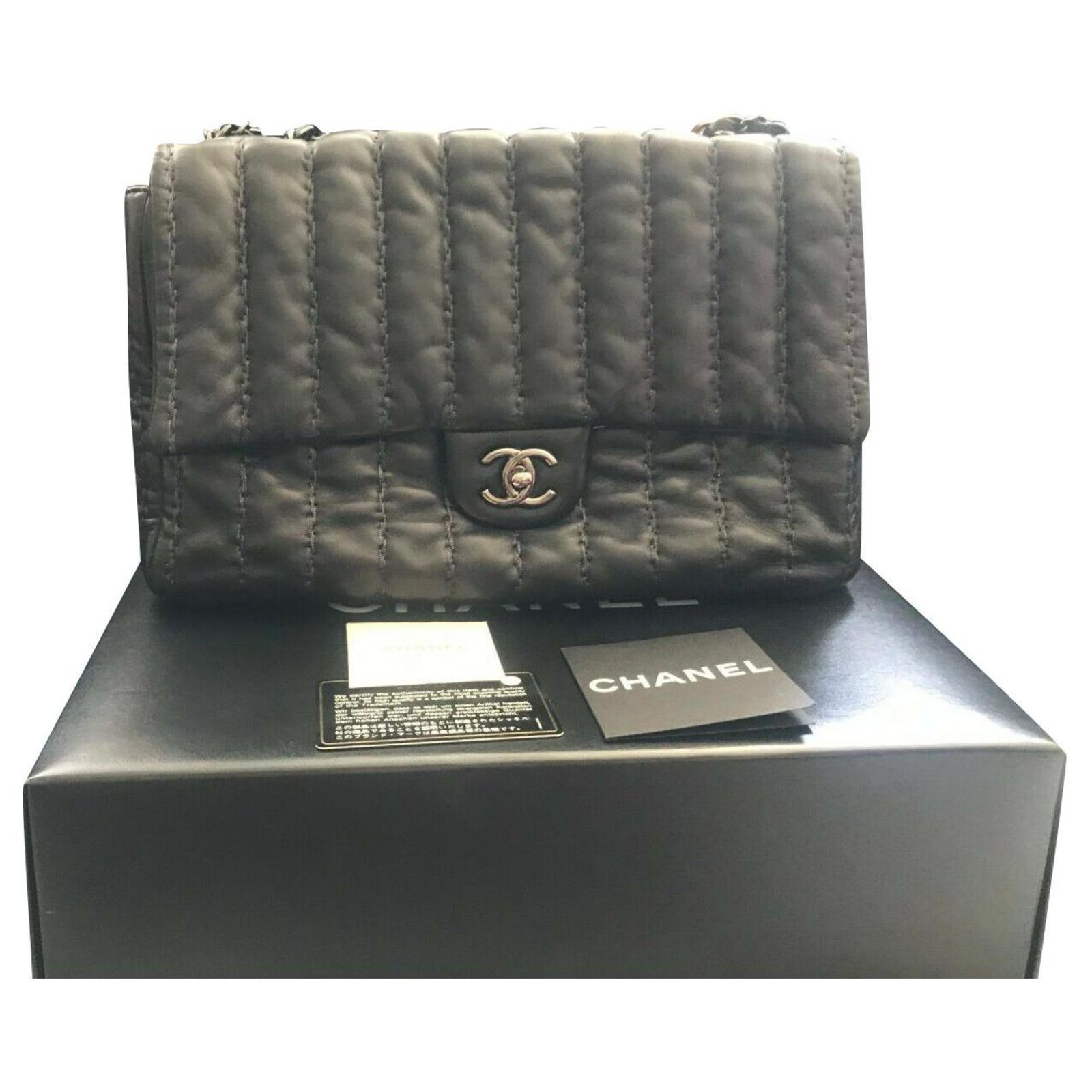 100% Authentic Chanel Lambskin black Shimmery Striped Quilted