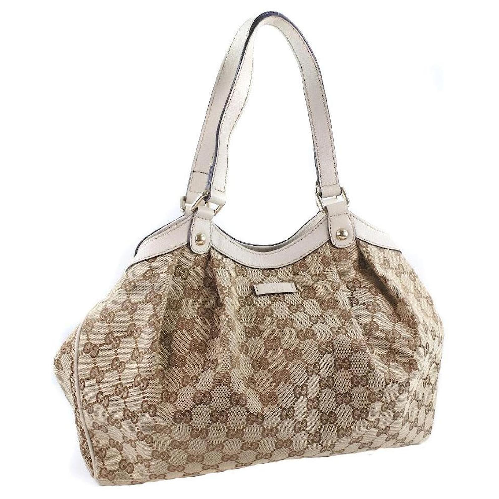 beige gucci purse