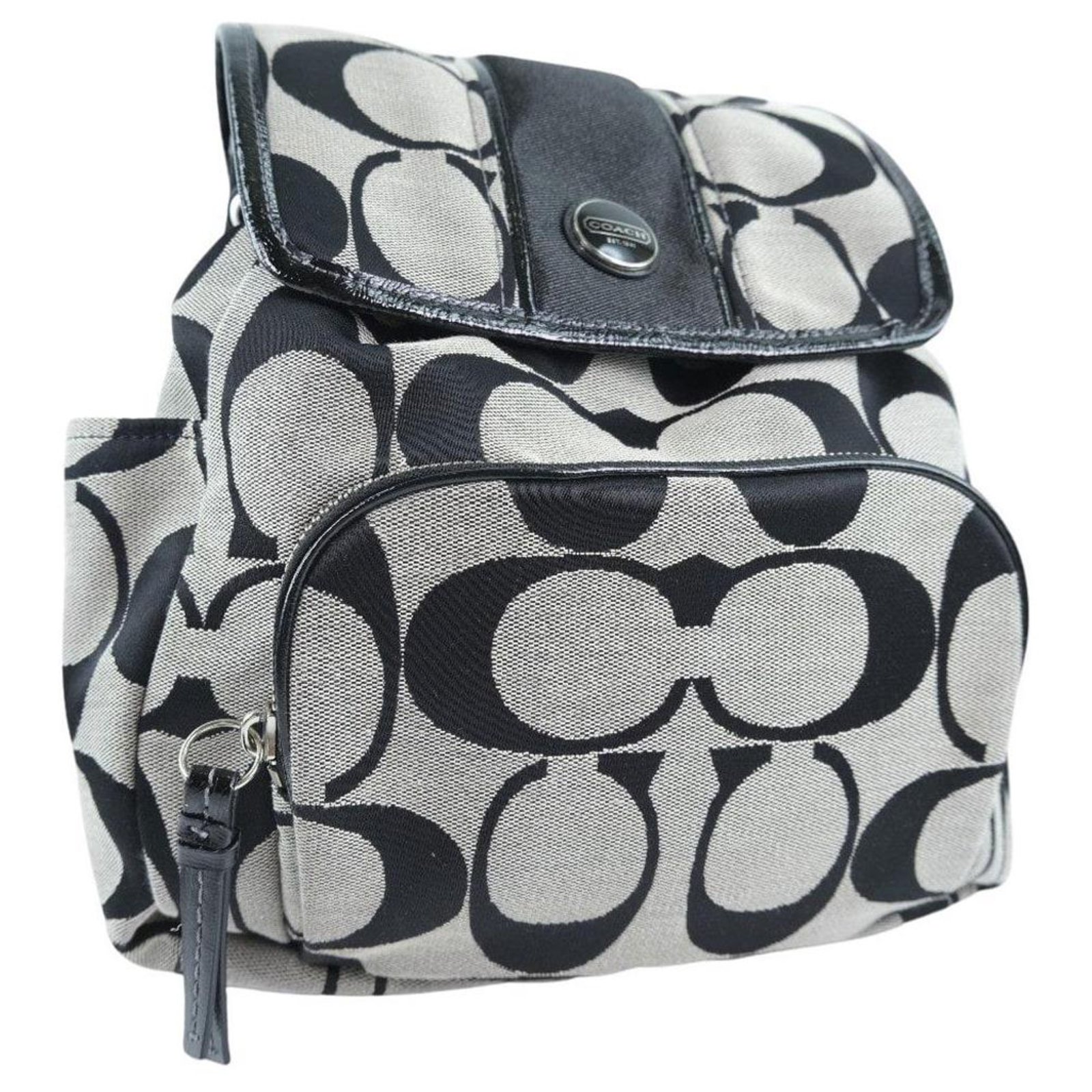 black and grey coach backpack