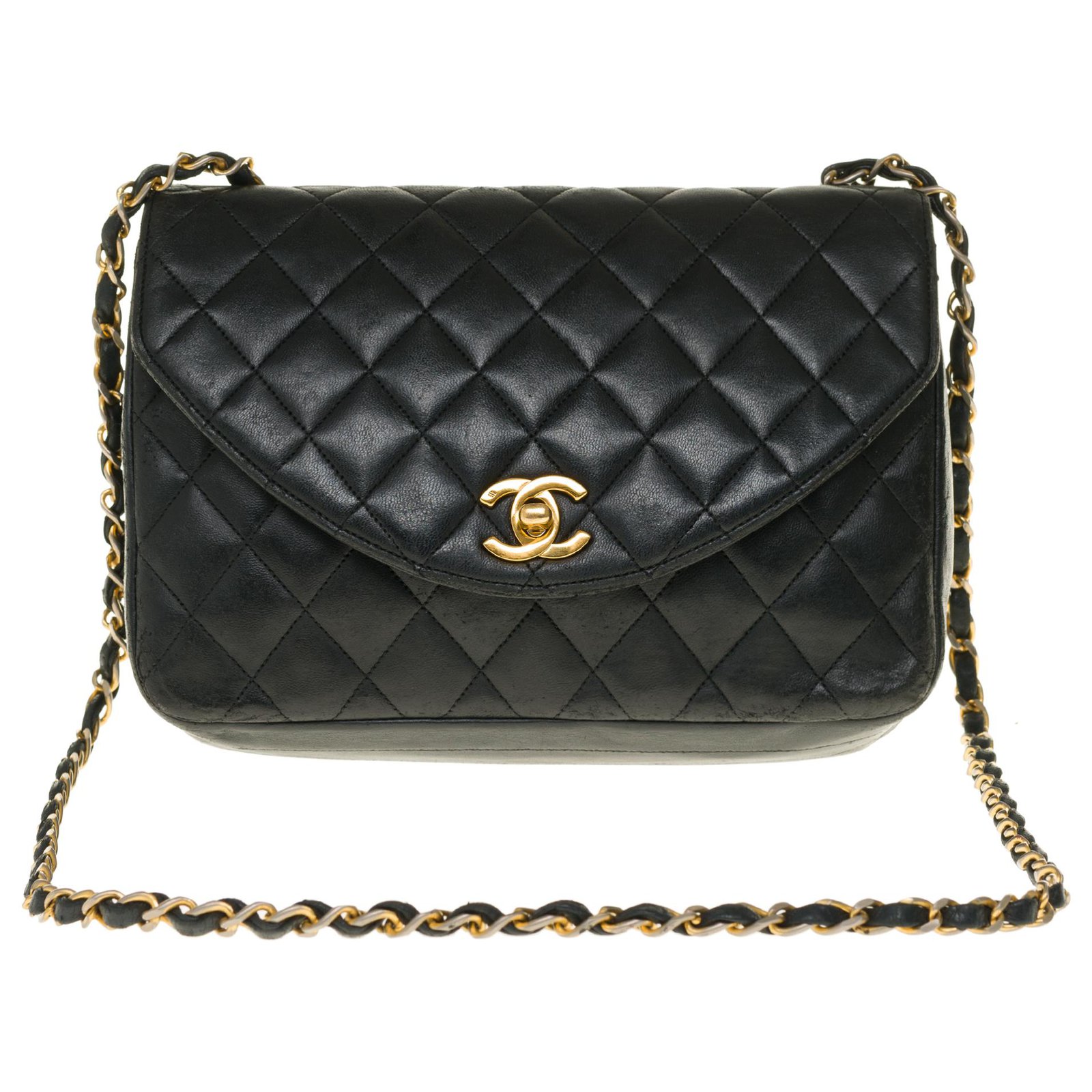 Chanel Classic handbag 23cm in black quilted leather, garniture en métal  doré