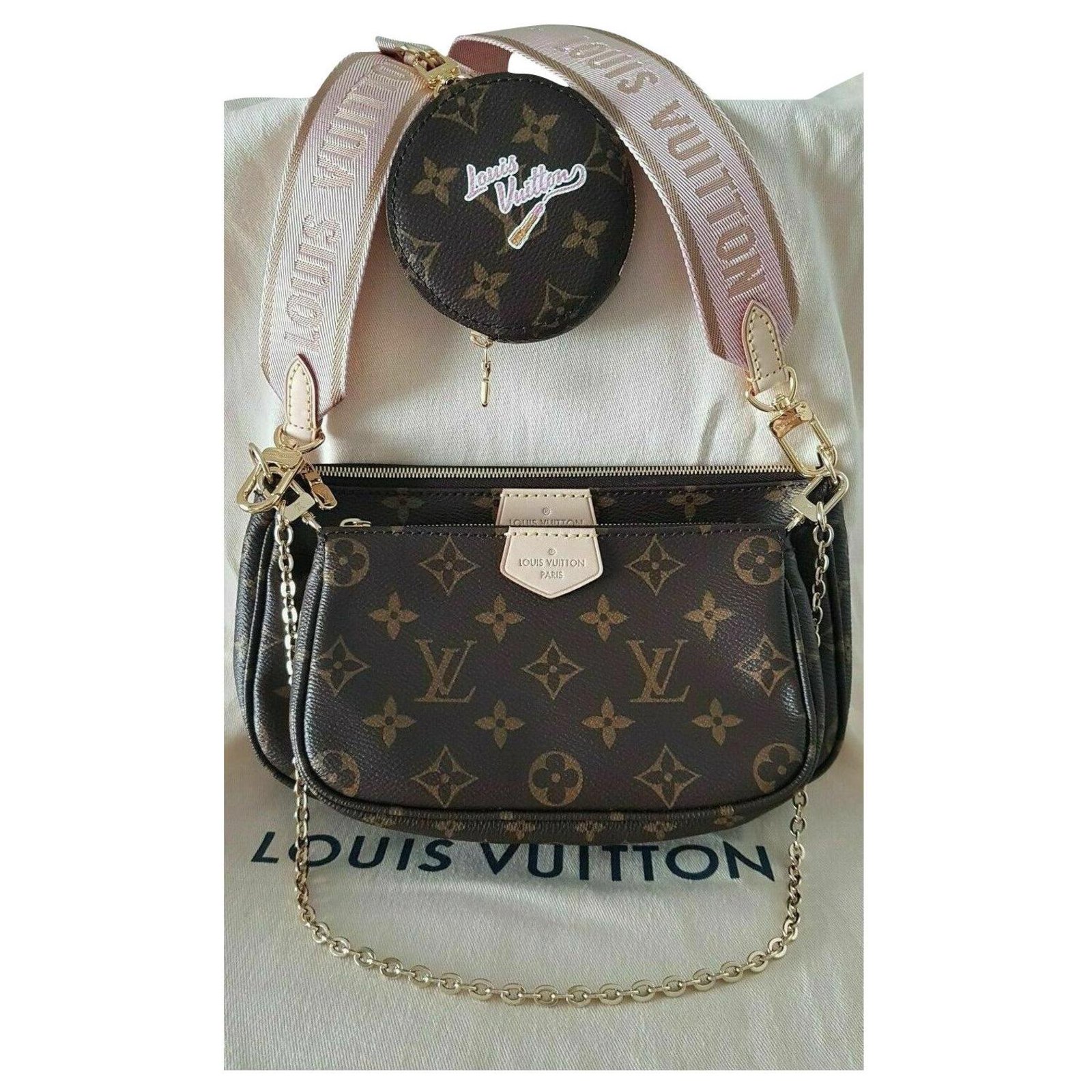 Pochette accessoire cloth handbag Louis Vuitton Pink in Cloth