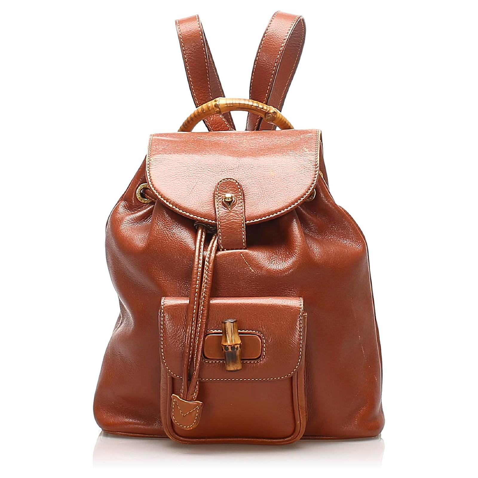 brown leather drawstring backpack