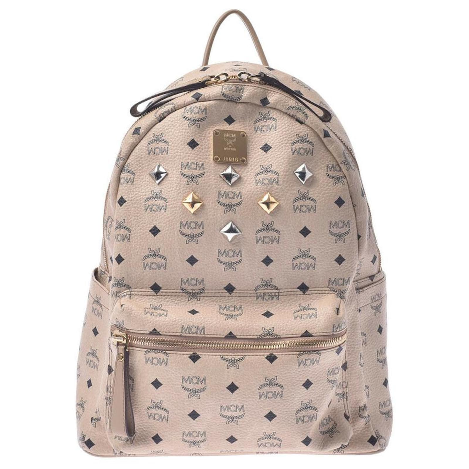cream mcm backpack