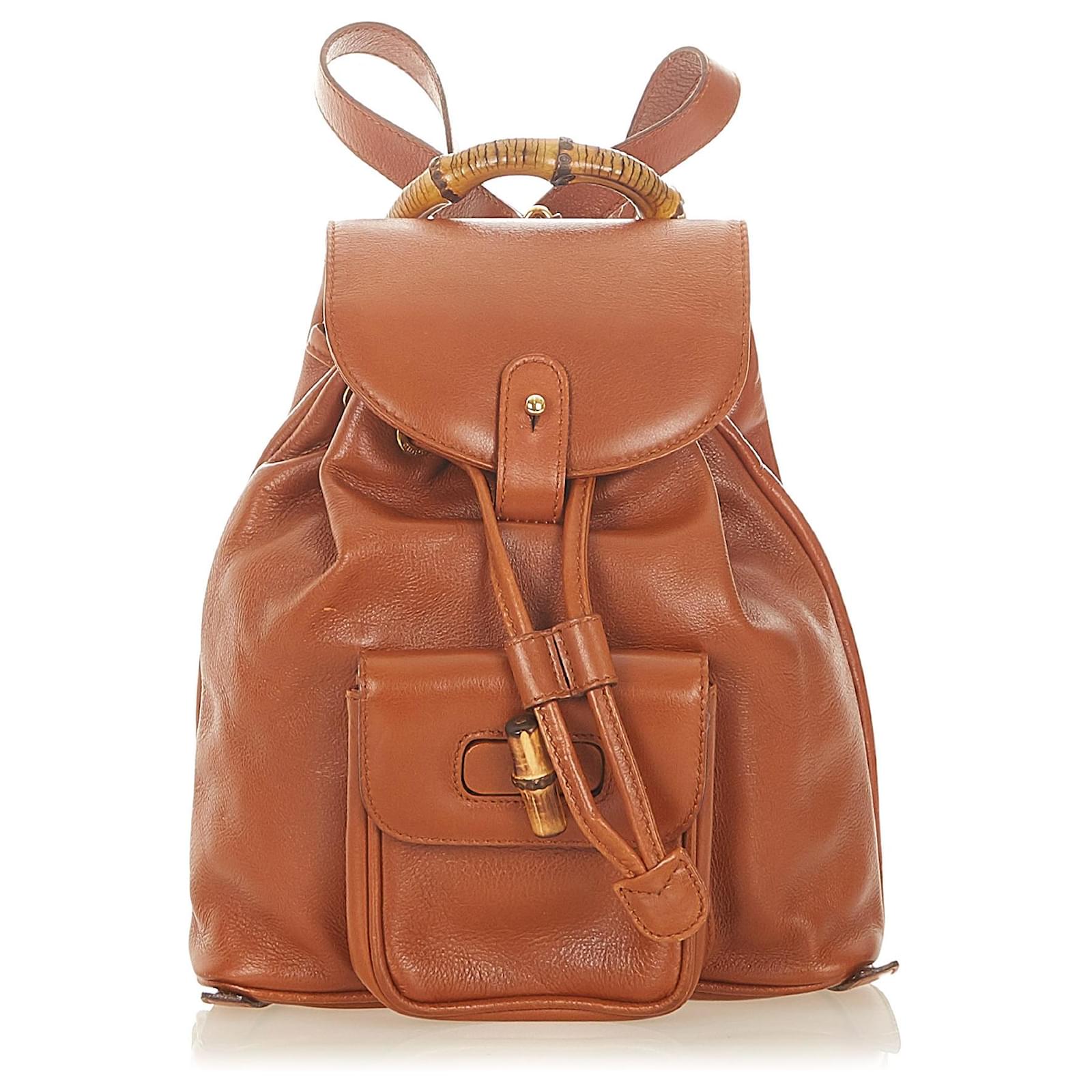 brown leather drawstring backpack