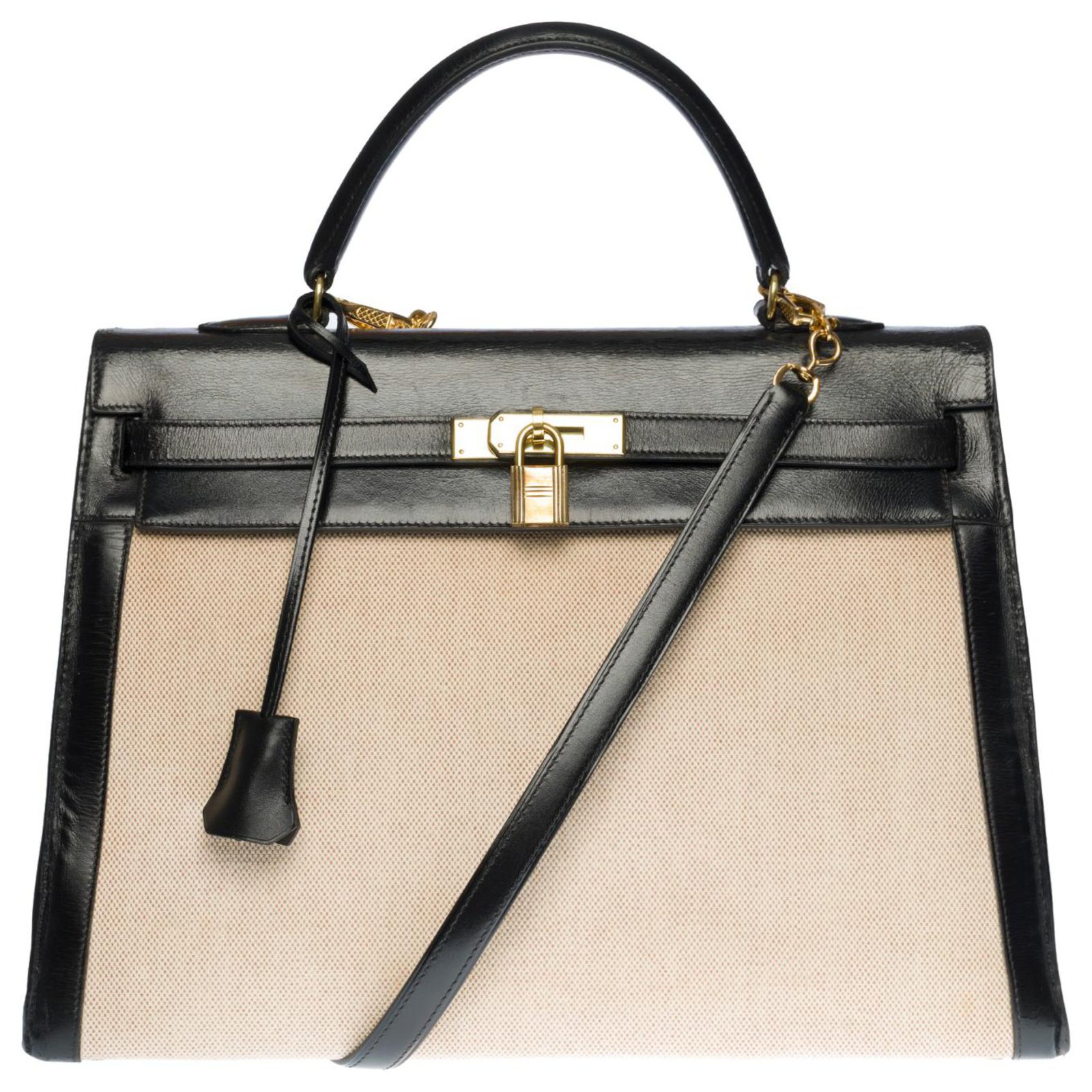 Hermès Stunning Hermes Kelly handbag 35 cm in black box leather and beige  canvas, garniture en métal doré Cloth ref.320223 - Joli Closet