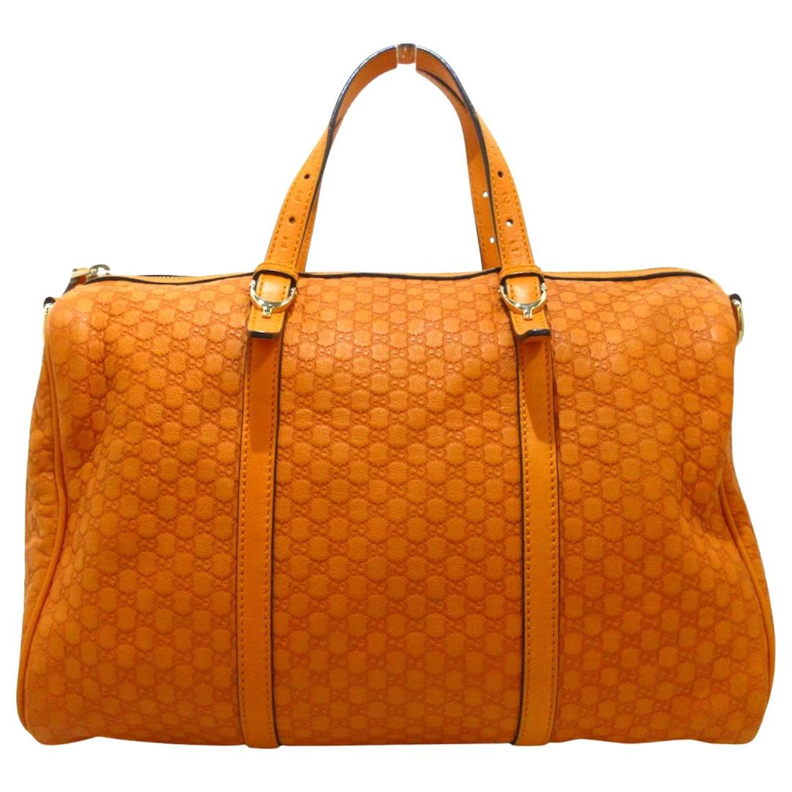 Gucci Supreme GG Orange Leather Joli Closet