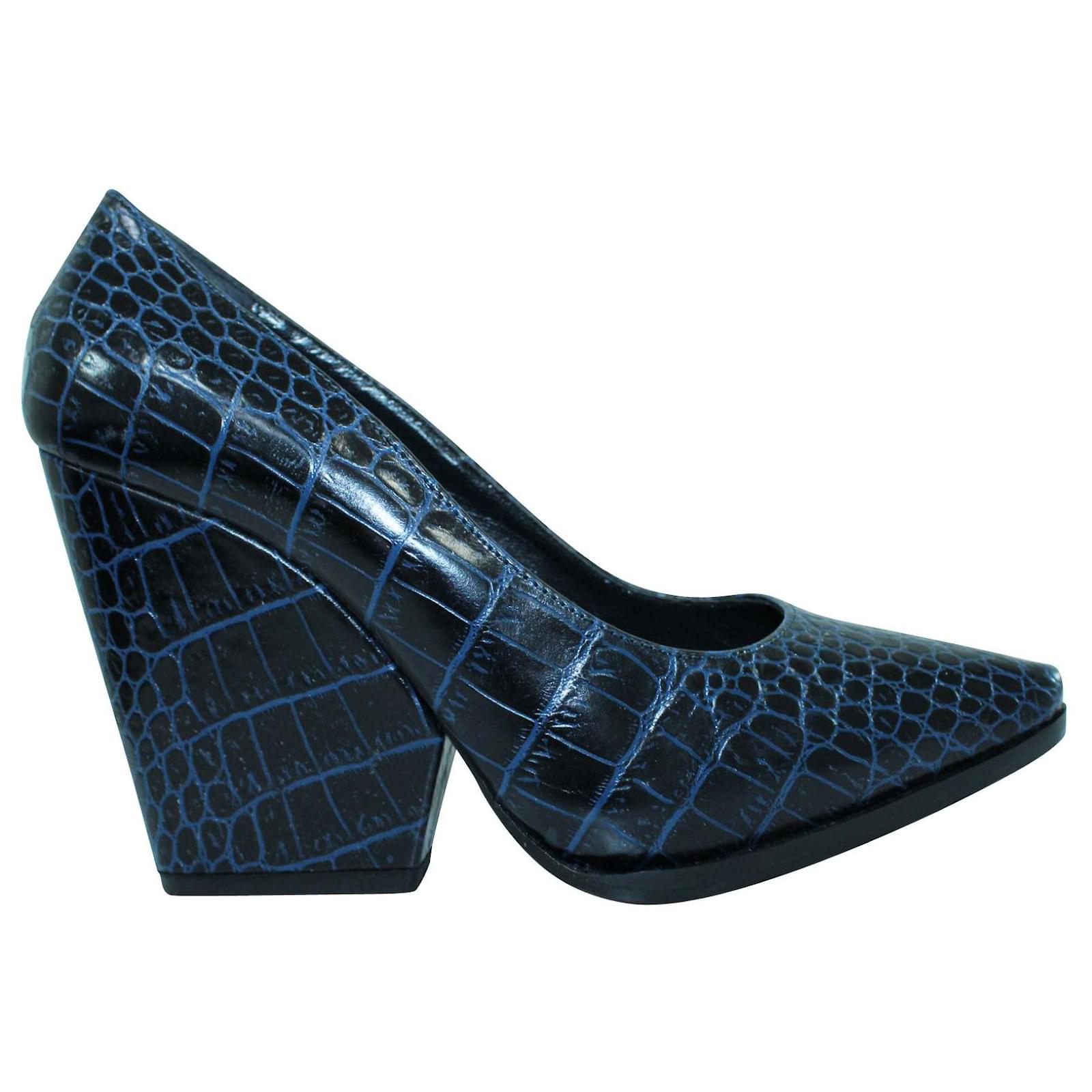 snakeskin pumps block heel