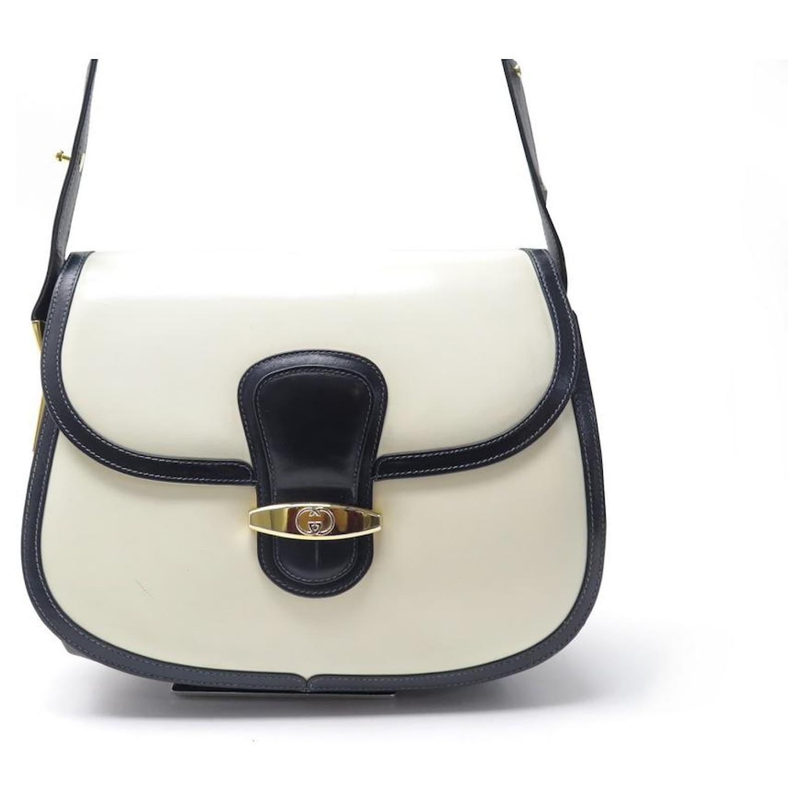 BOLSO DE MANO VINTAGE GUCCI CIERRE CON LOGO GG EN PIEL AZUL MARINO Y BOLSO  DE MANO CREMA Cuero ref.329260 - Joli Closet