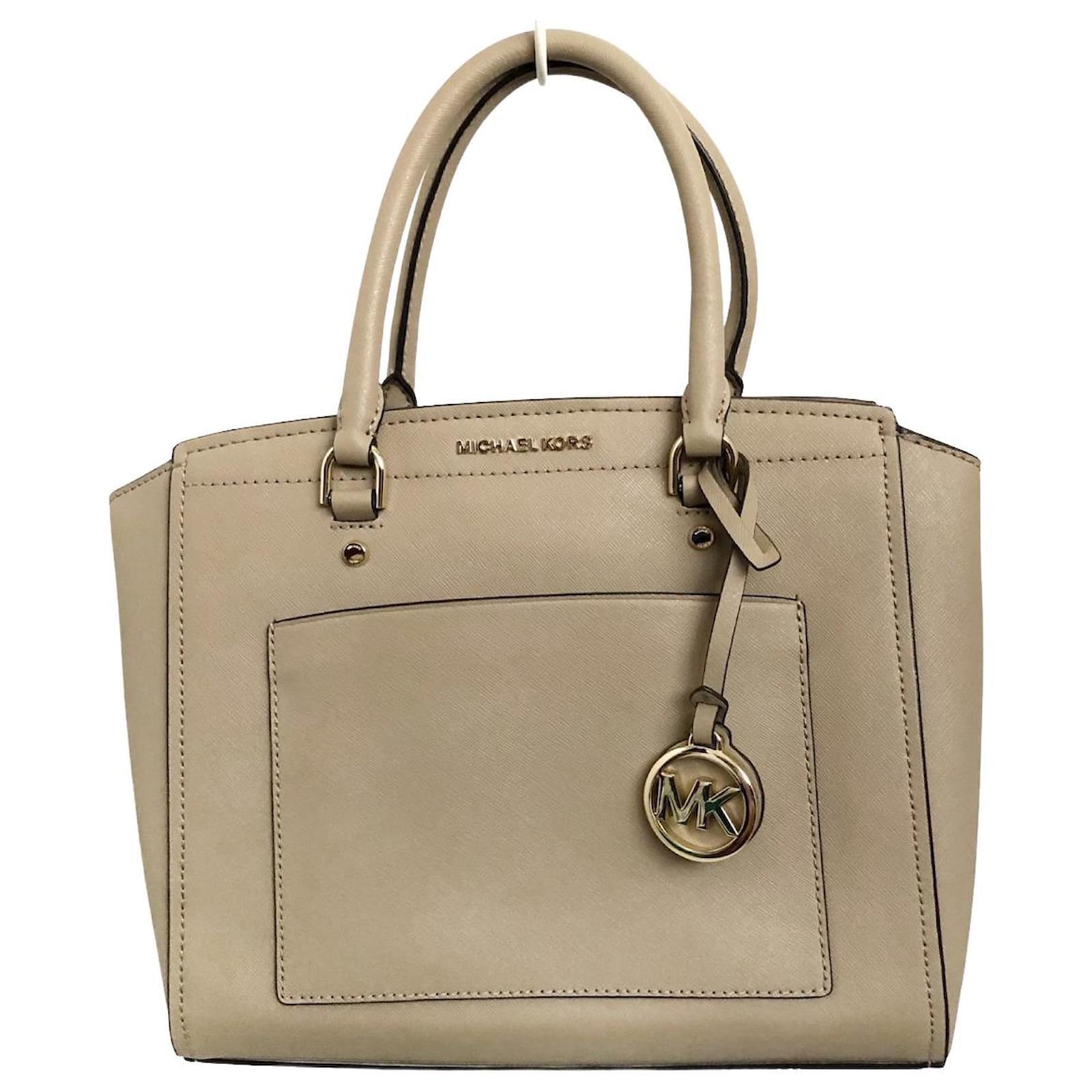 Michael kors beige purse on sale