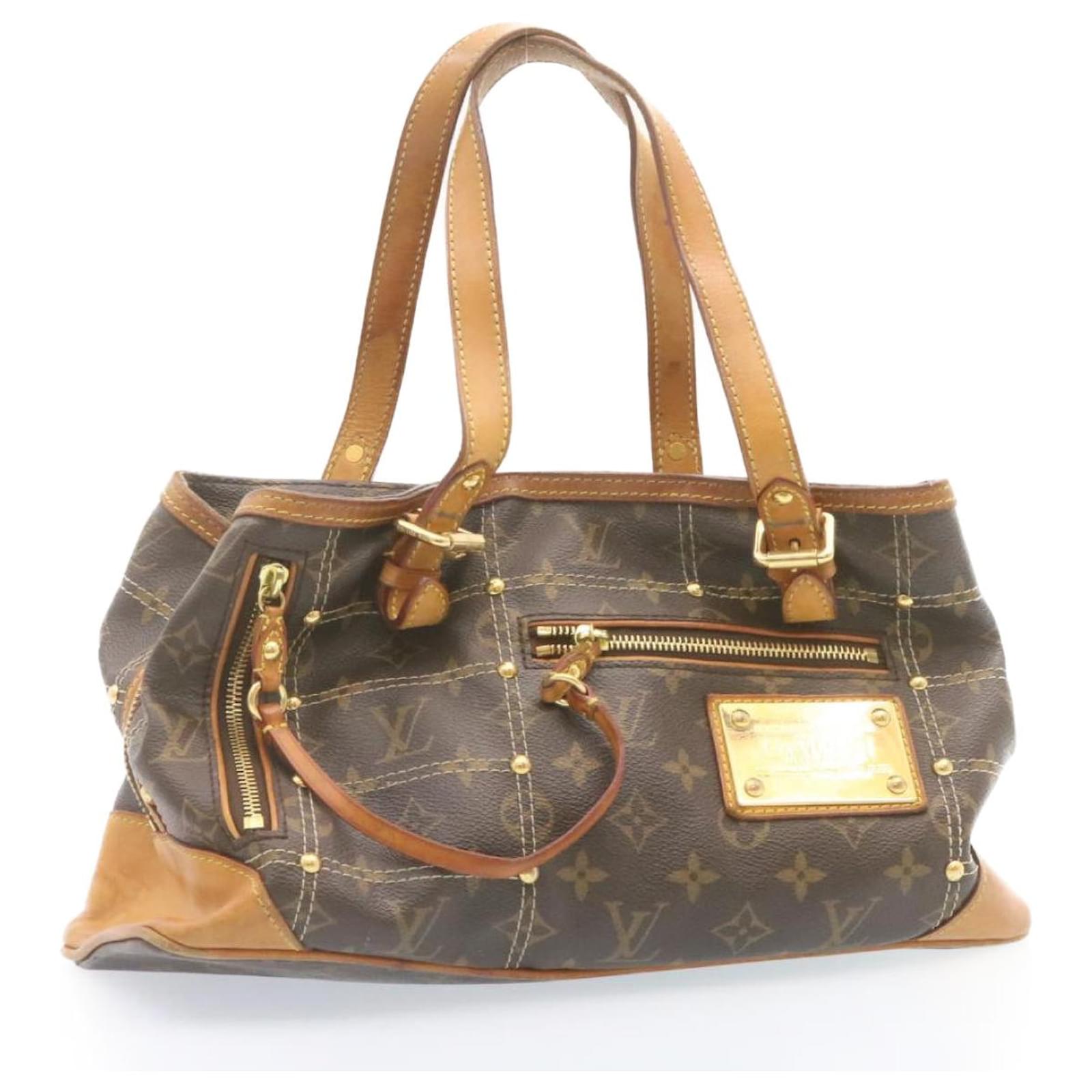 Louis Vuitton Rivets Leather Handbag
