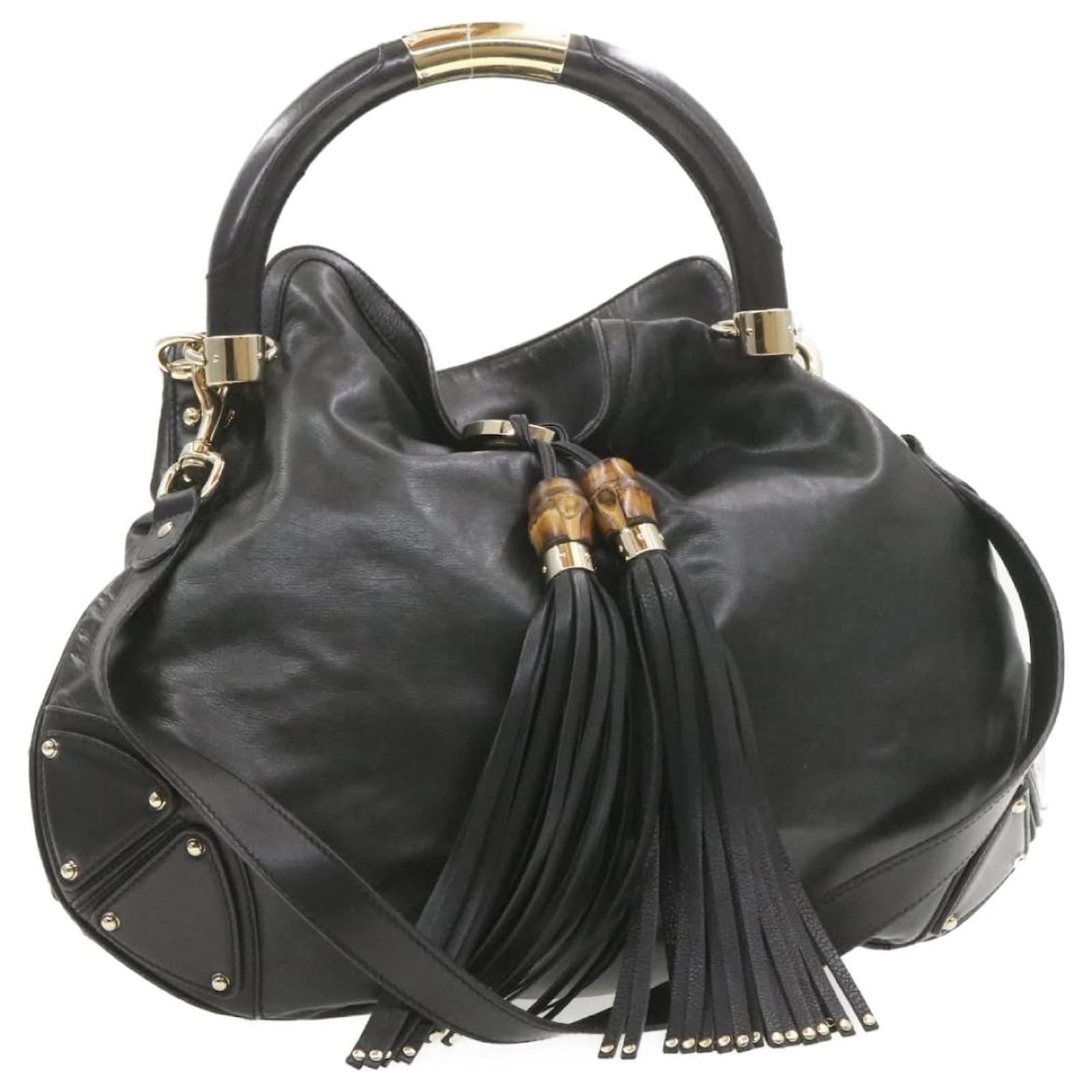 gucci bag with bamboo tassels