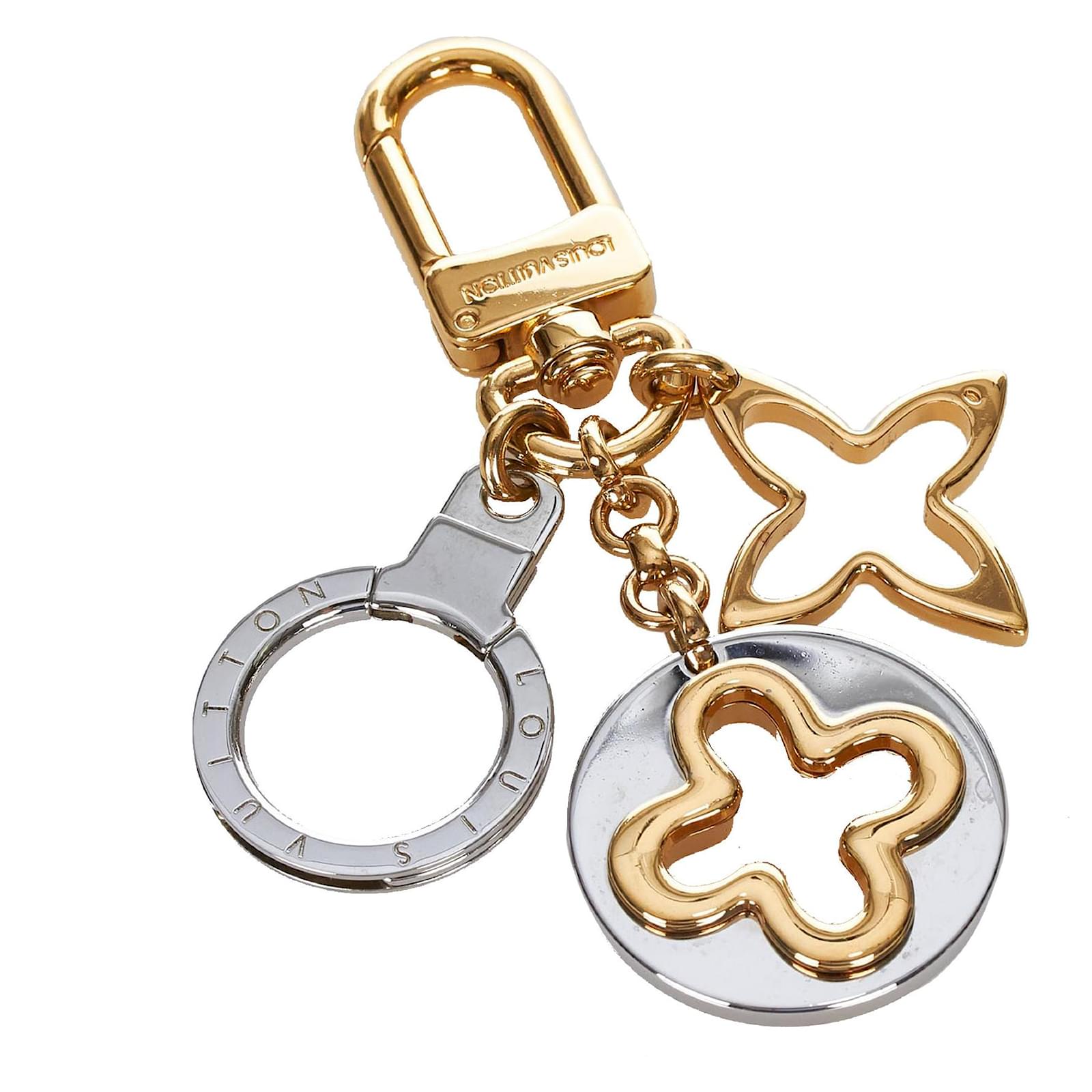 Louis Vuitton Gold Porte Cles Insolence Key Chain Silvery Golden Metal  ref.337937 - Joli Closet