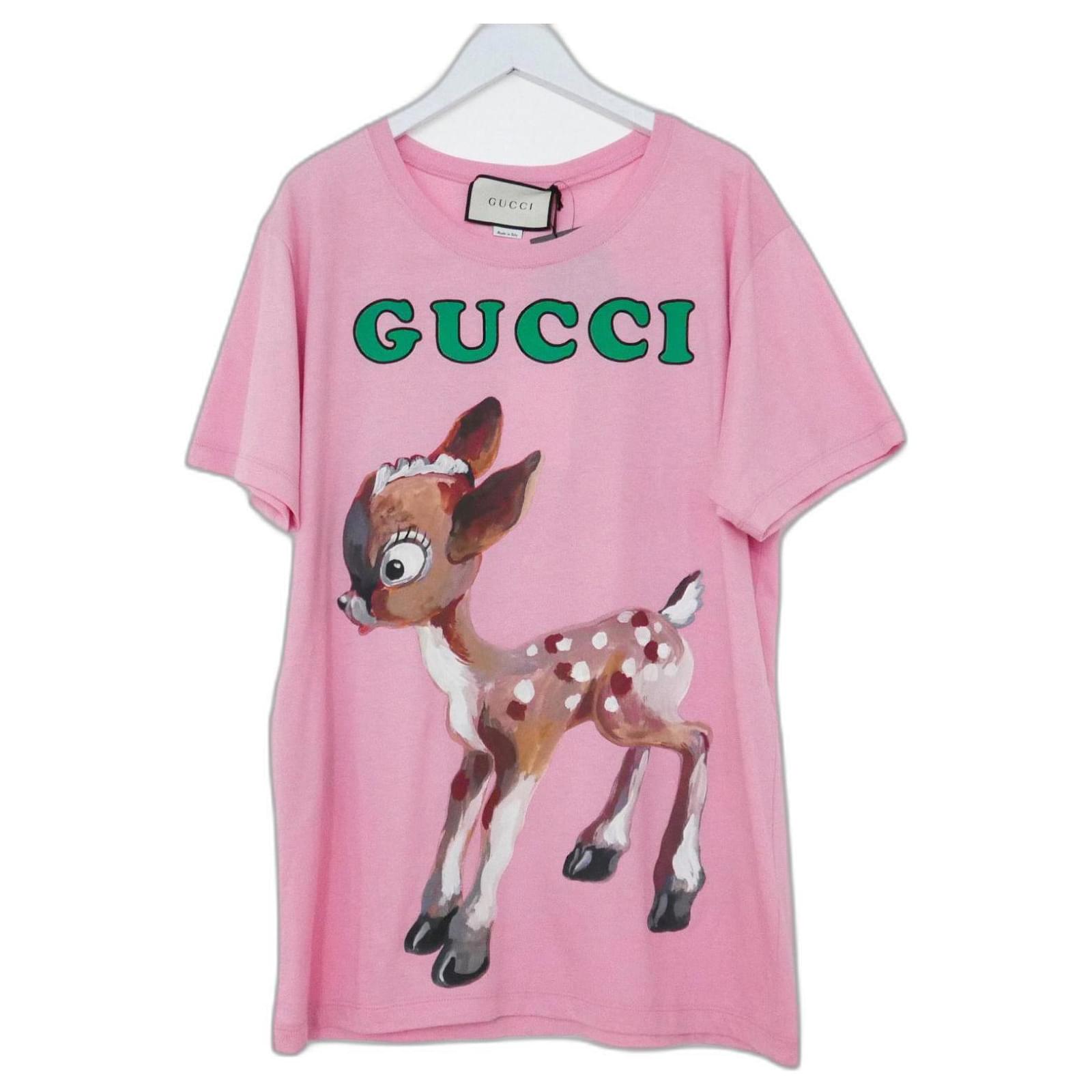 gucci in pink shirt