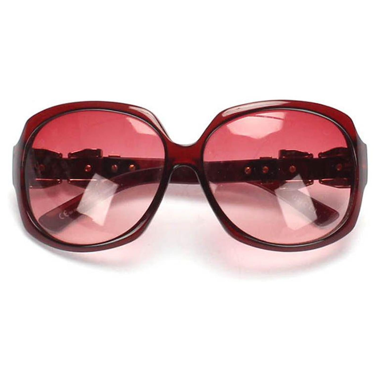 red tinted round sunglasses