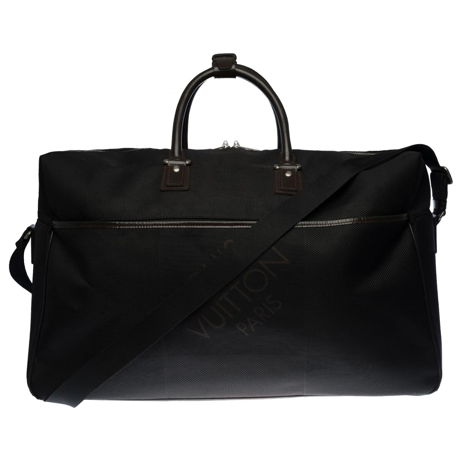 Louis Vuitton travel bag with shoulder strap in black canvas and silver  metal hardware Cloth ref.362684 - Joli Closet