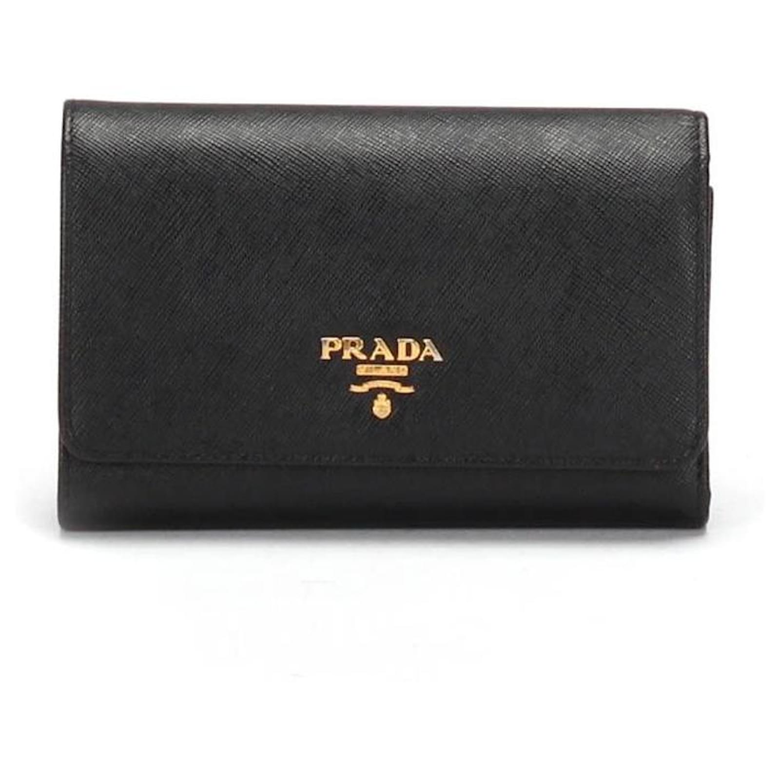 Prada Saffiano Tri-Fold Wallet in black calfskin leather Pony-style ...