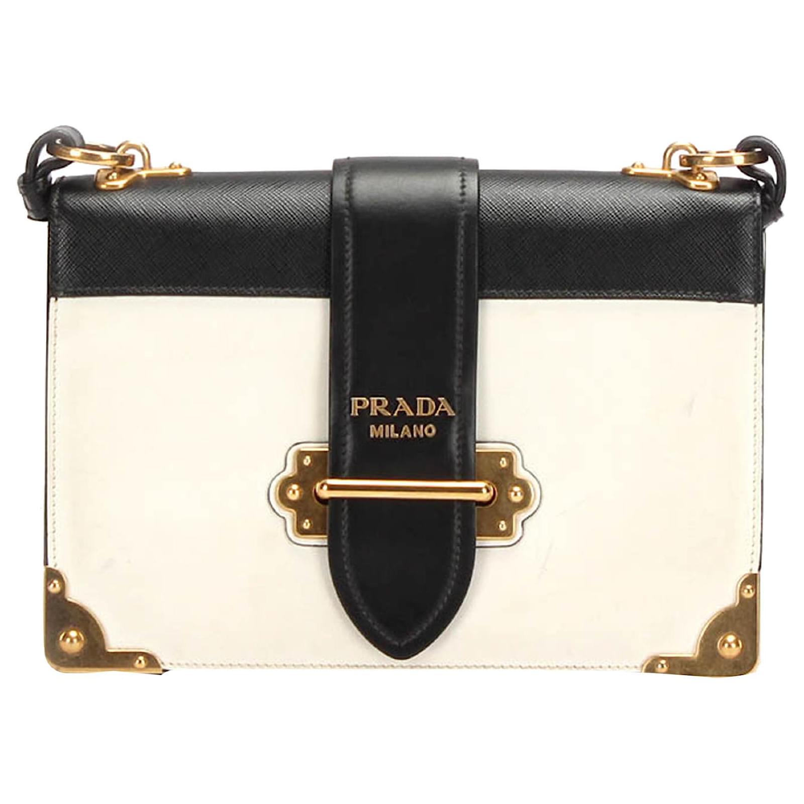 prada bolsa black and gold