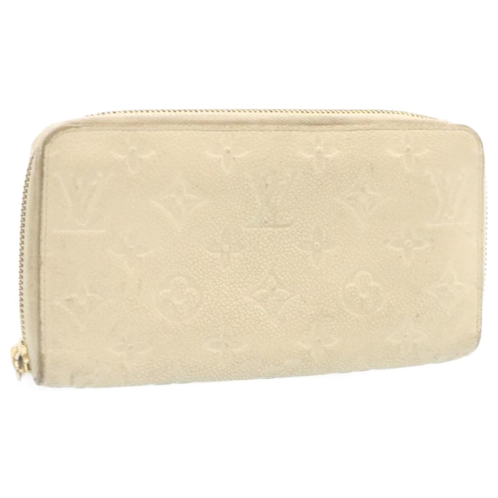 Louis Vuitton, Bags, Louis Vuitton Ivory Monogram Empreinte Leather Secret  Long Wallet