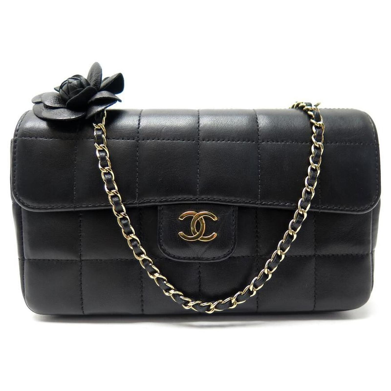 BORSA A MANO CHANEL CAMELIA MINI IN PELLE TRAPUNTATA NERA BORSA A MANO  BANDOULIERE Nero ref.375786 - Joli Closet
