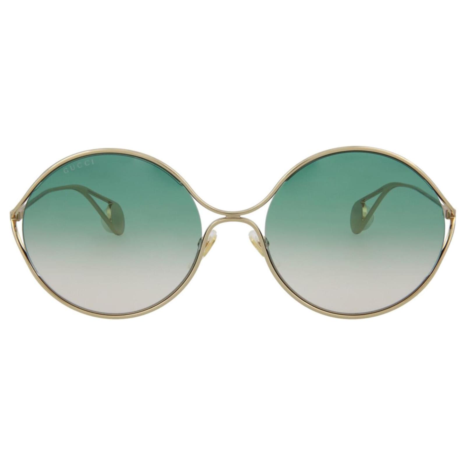 Gucci Occhiali da sole ovali in metallo D'oro Metallico ref.377970 - Joli  Closet