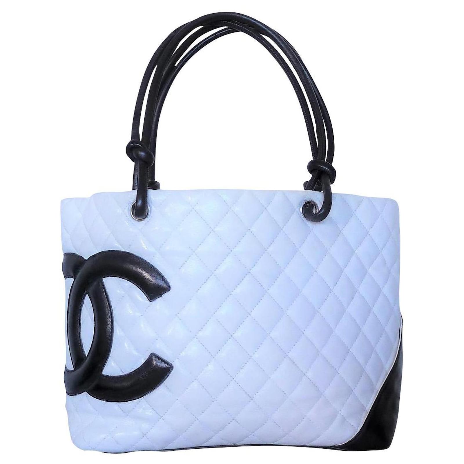 blue quilted chanel bolsa