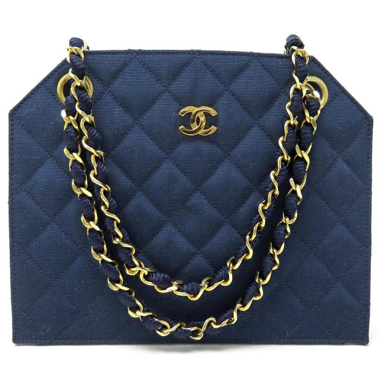 VINTAGE CHANEL HANDBAG 1986 IN QUILTED FABRIC GOLD CHAIN BANDOULIERE PURSE  Blue Cloth ref.383360 - Joli Closet