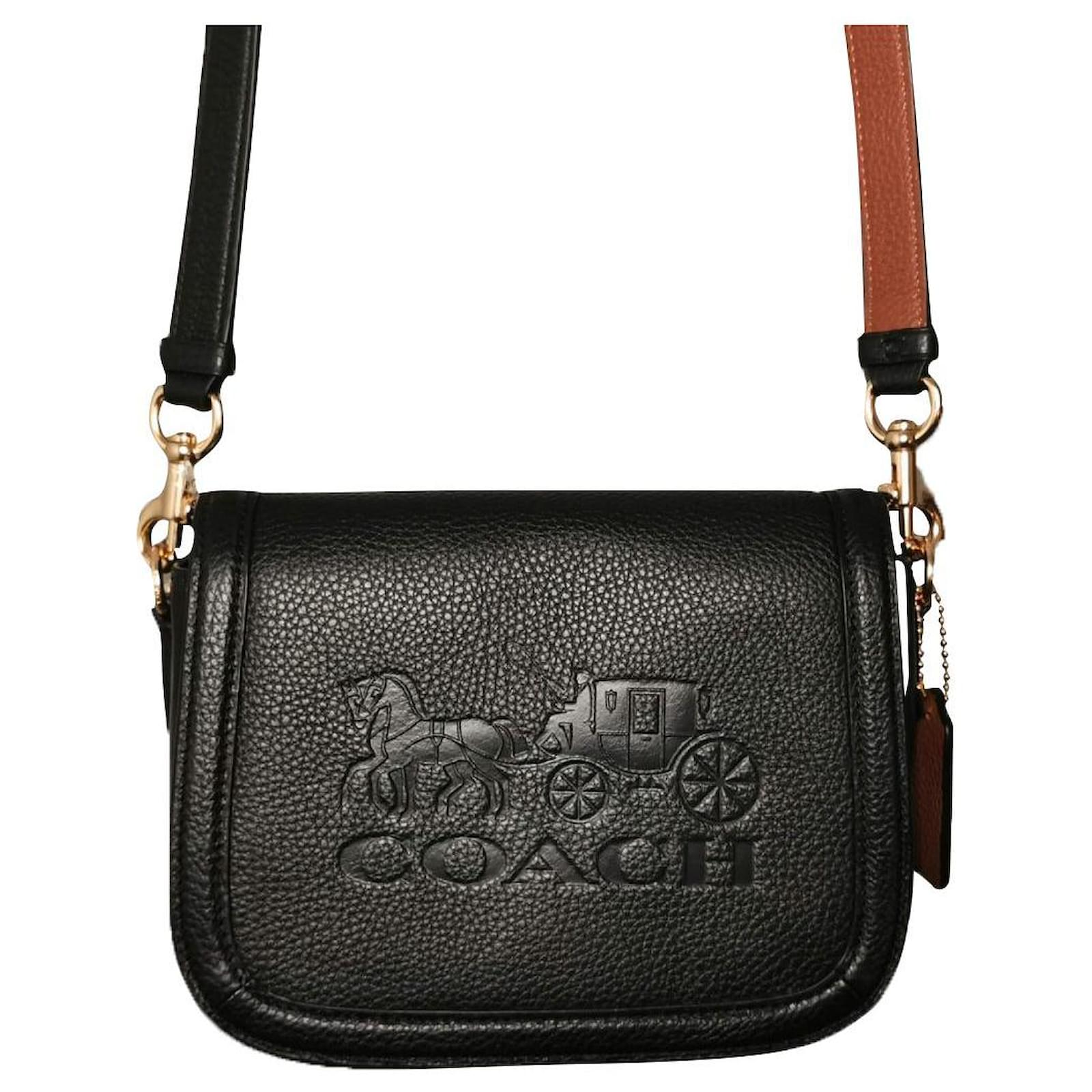 black and brown leather coach purse