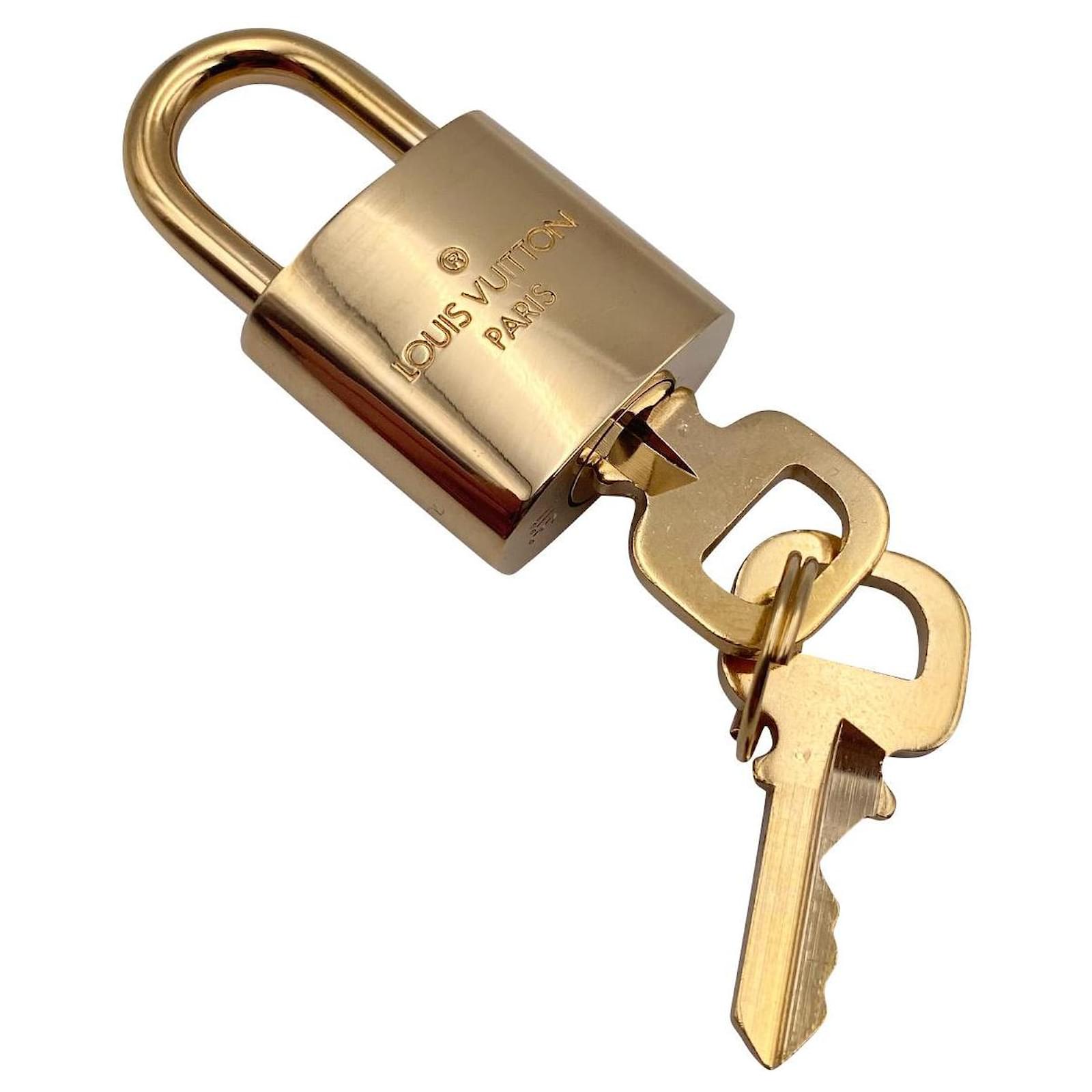 Louis Vuitton padlock 311 gold - Joli Closet