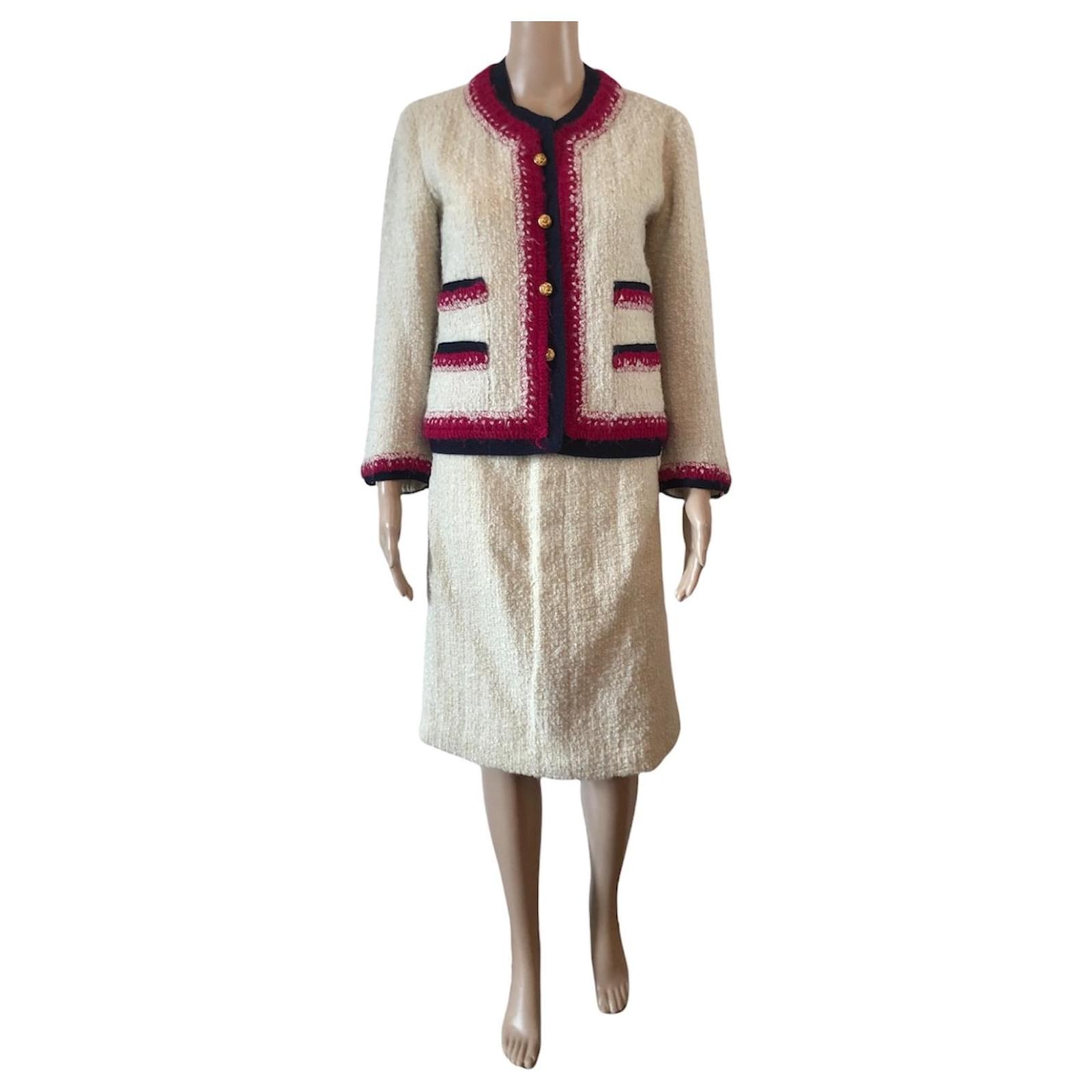 A Coco Chanel Bouclé Wool Suit with Scarf, with a Coco Chanel Silk