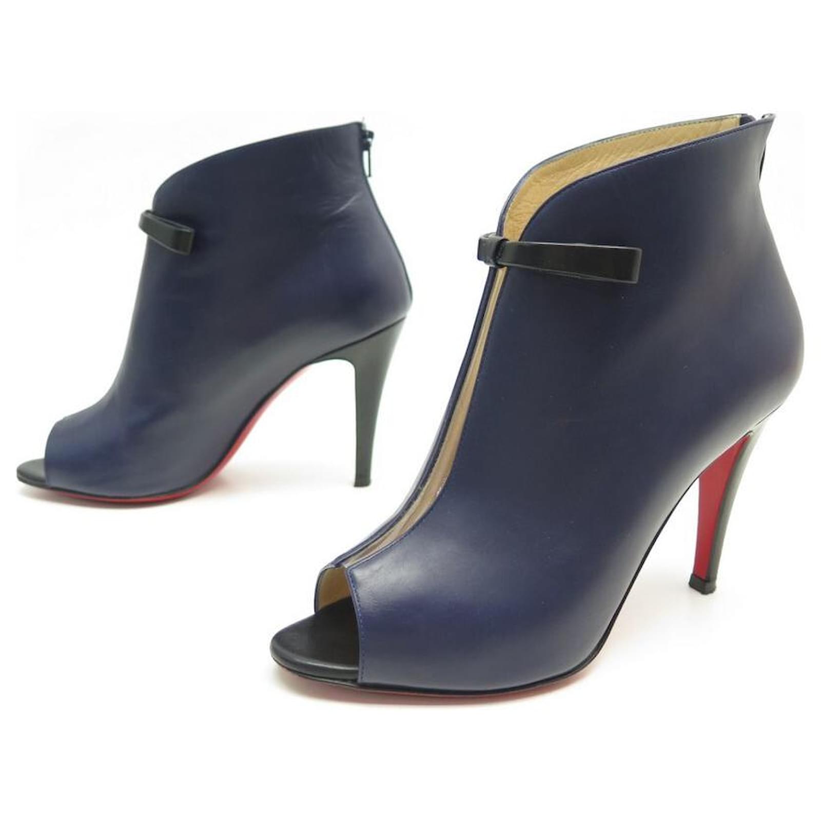 christian louboutin low heel boots