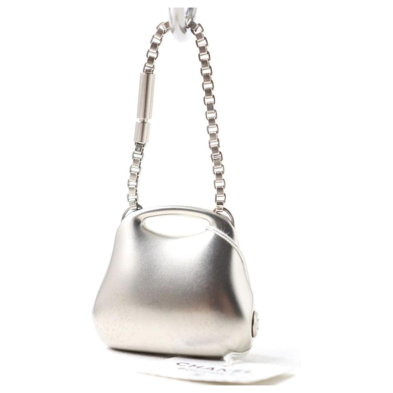 chanel bolsa charm