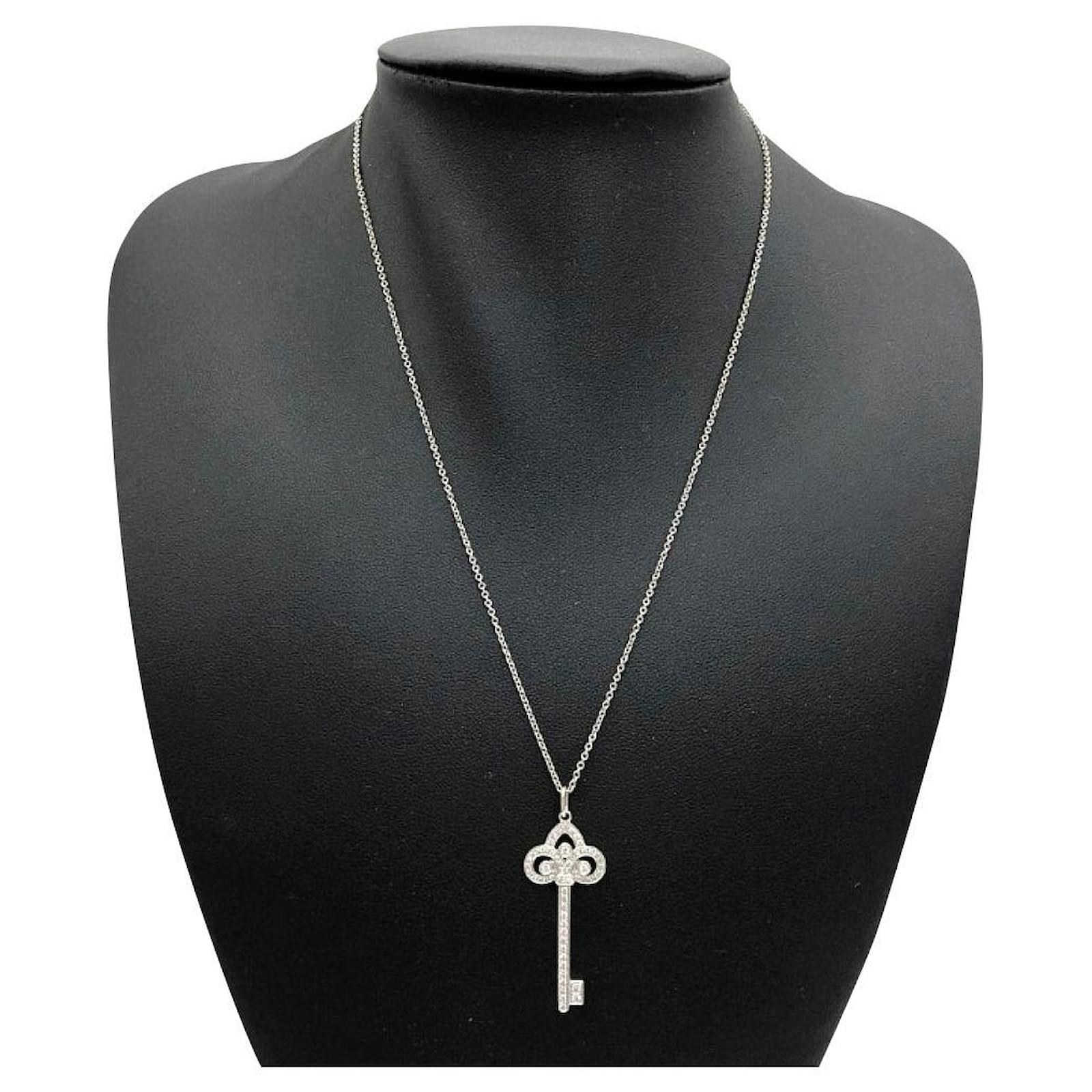 Tiffany fleur de lis on sale necklace