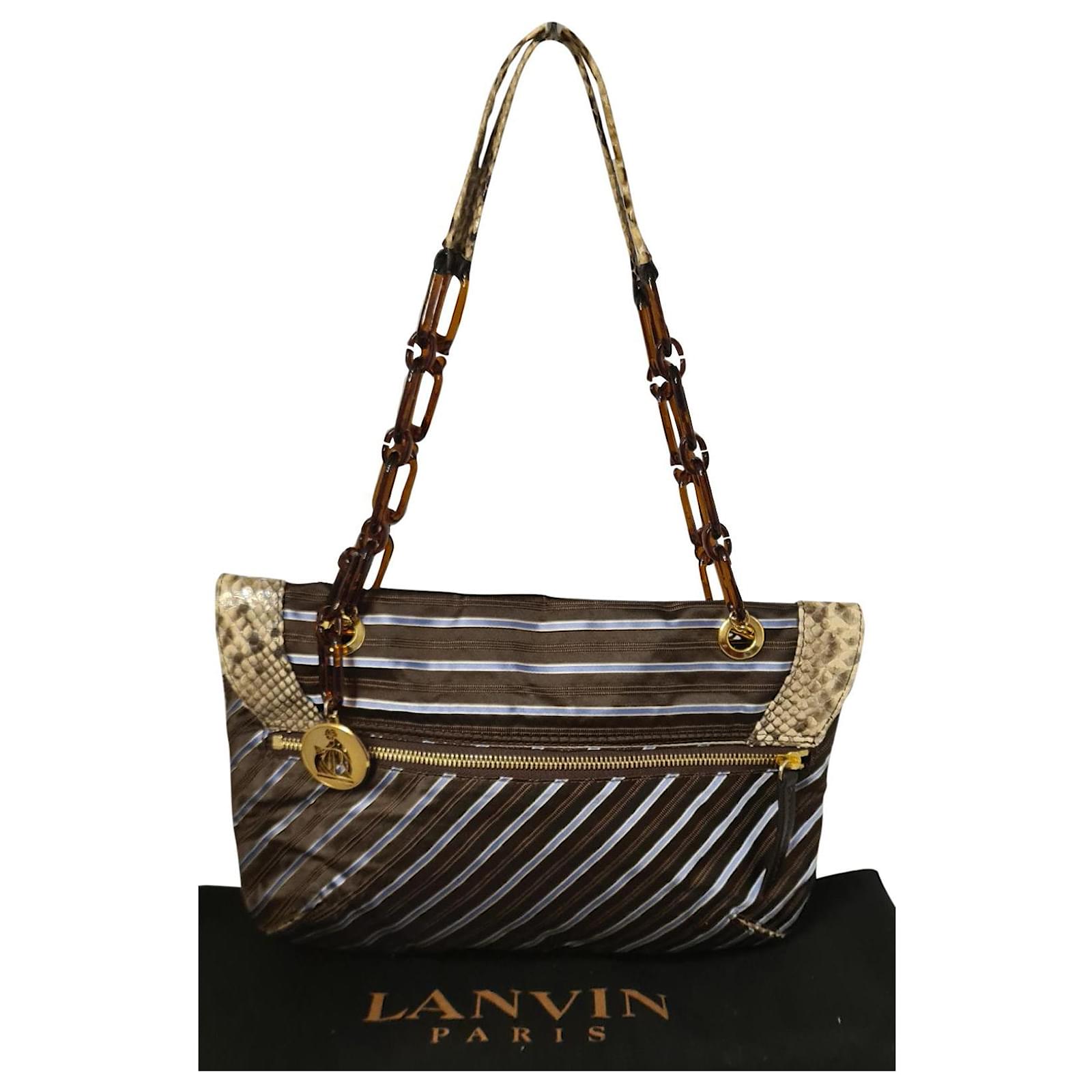 LANVIN “Jeanne” Black Leather Braided Pom Pom Tassel Strap Flap Clutch  Handbag at 1stDibs | lanvin bag vintage, black caviar leather minimalist  jean clutch, vintage lanvin bag