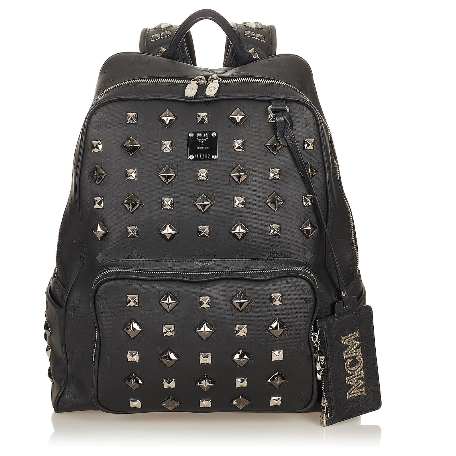 Mcm black studded discount backpack