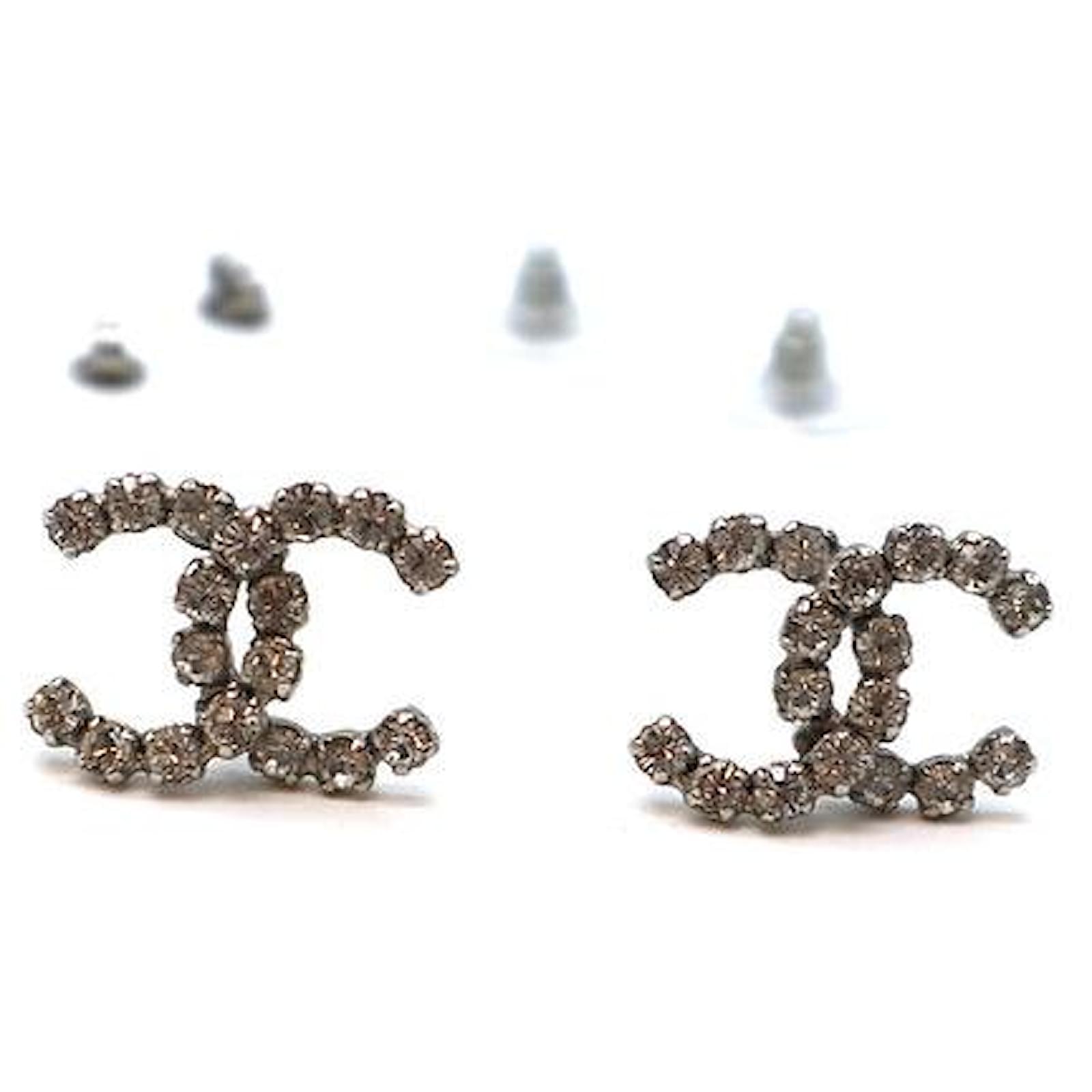 Misbruge hoppe hval Chanel Gold CC Crystals Black Enamel Star Clip On Earrings Golden Metal  ref.434776 - Joli Closet